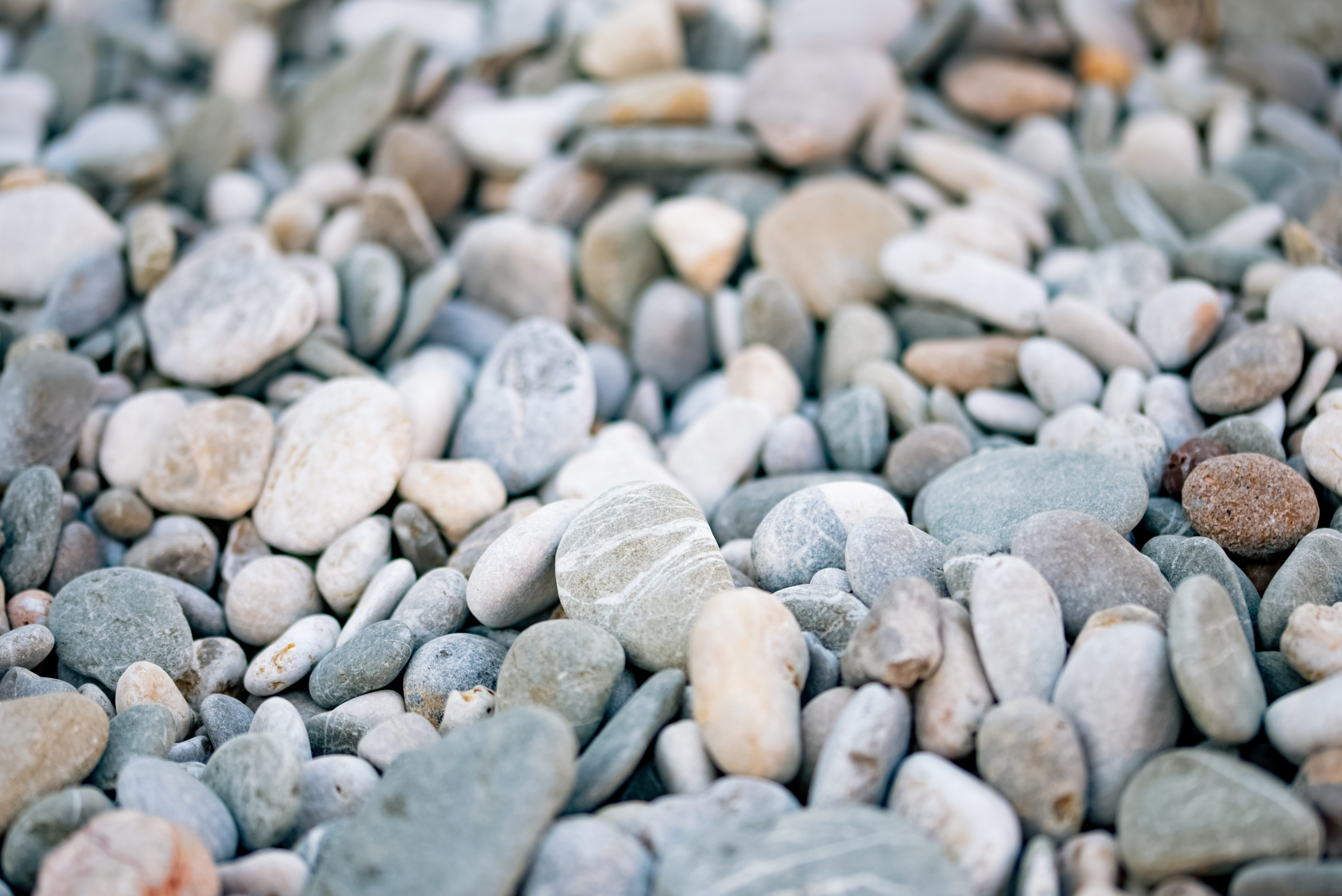 82372 download wallpaper stones, pebble, beach, macro, grey screensavers and pictures for free