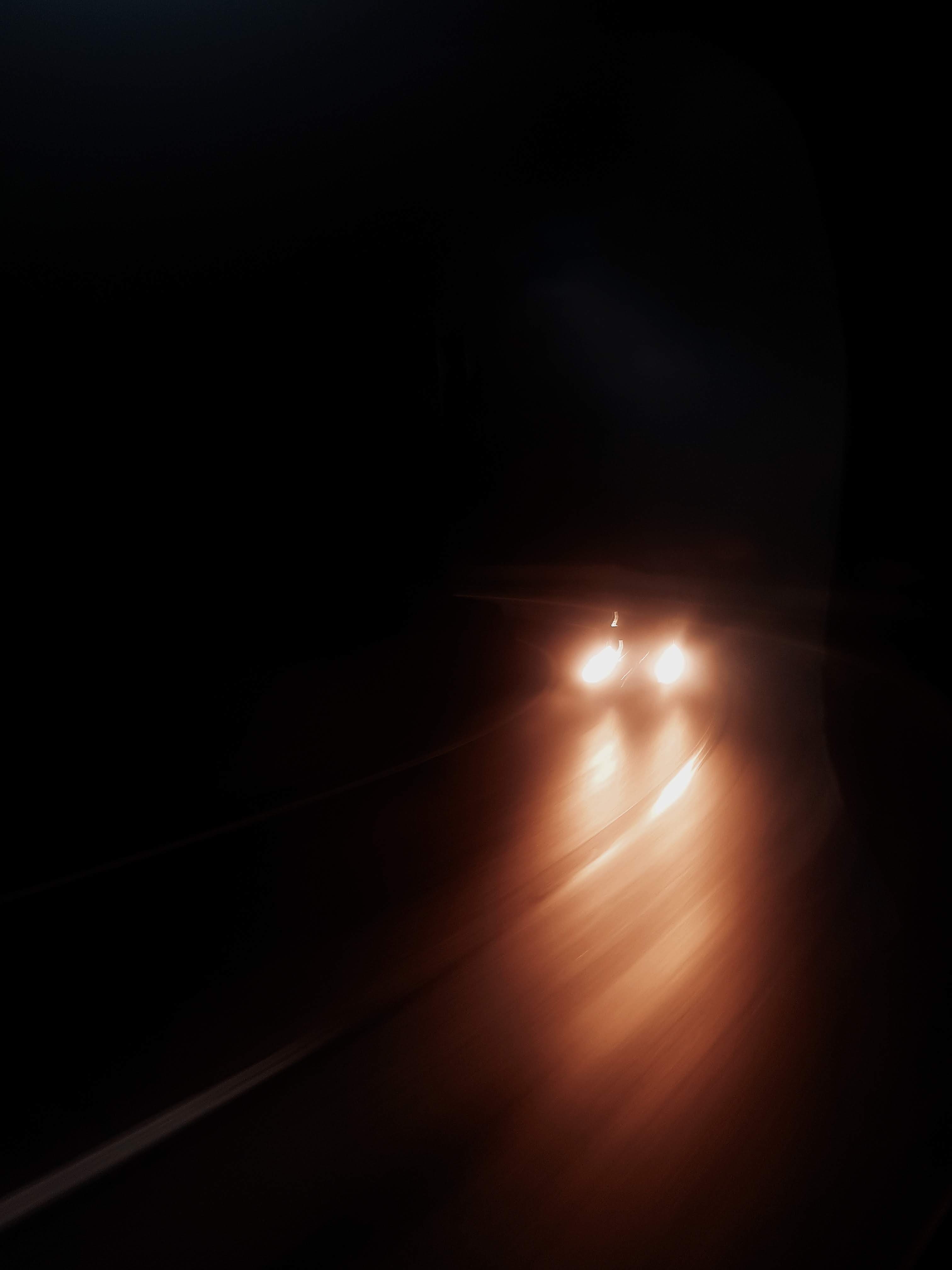 58853 download wallpaper headlights, night, lights, dark, shine, light, traffic, movement, blur, smooth screensavers and pictures for free