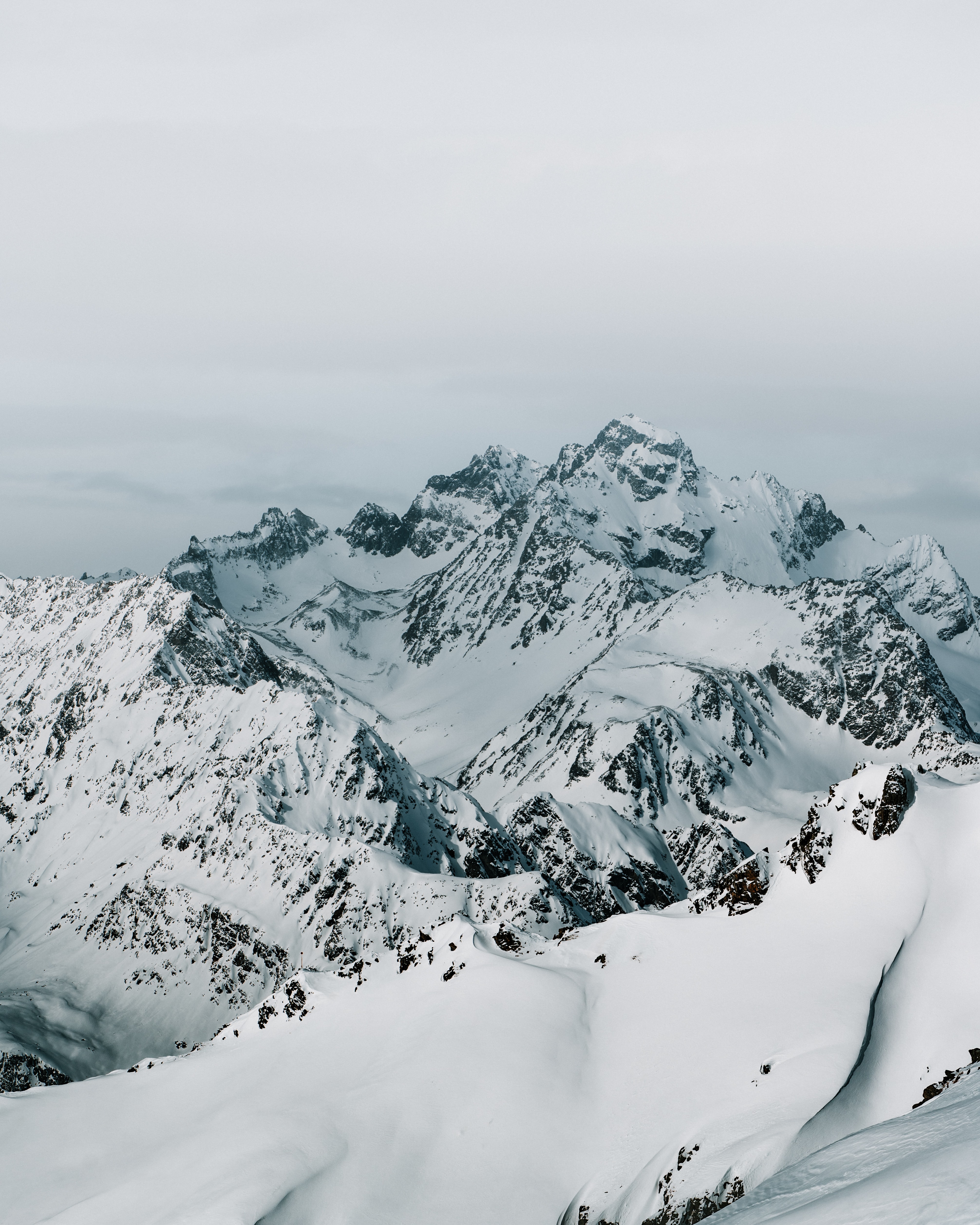 111675 скачать обои горный хребет, природа, снег, горы, вершины, пейзаж - заставки и картинки бесплатно