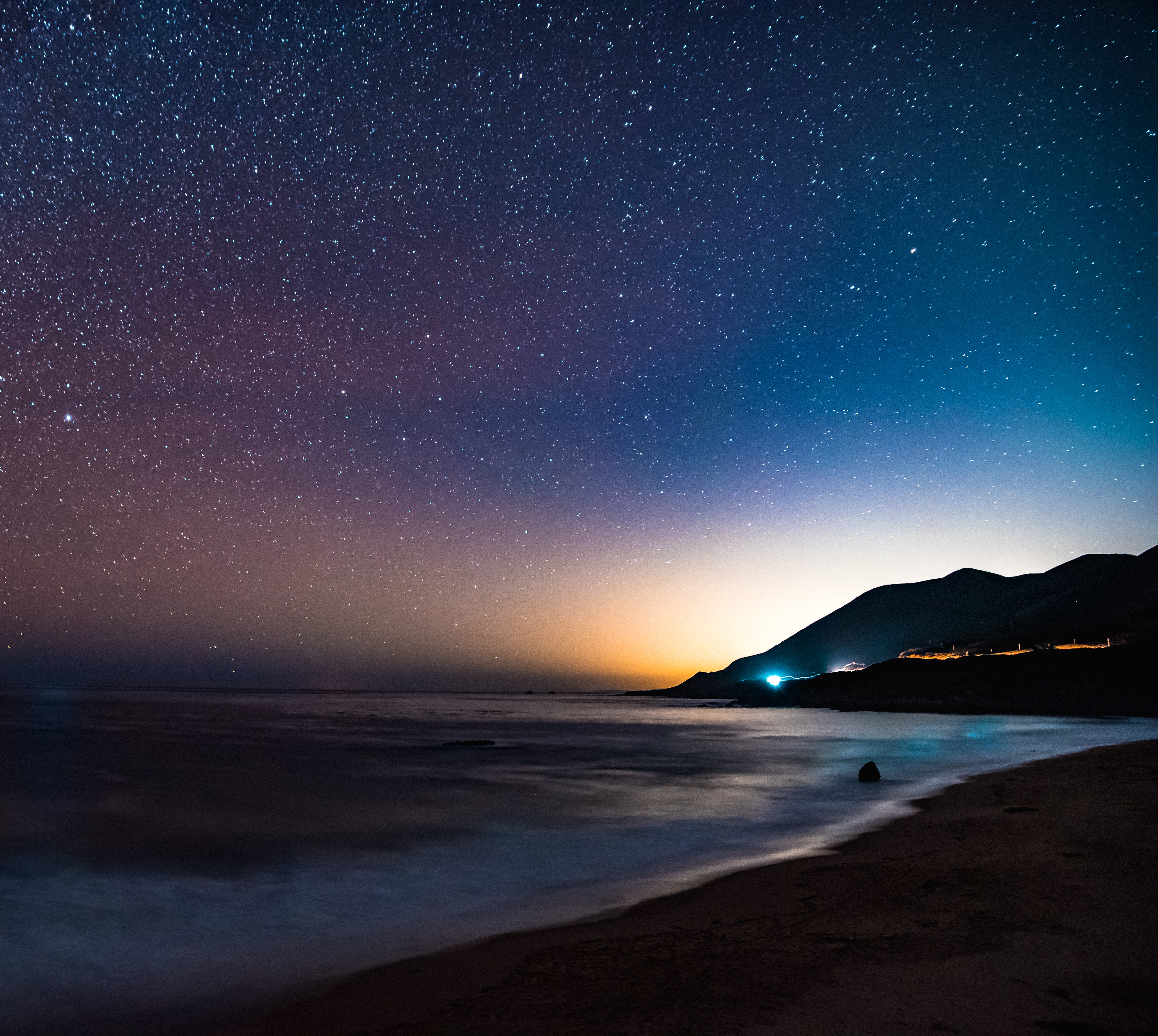 88704 download wallpaper starry sky, nature, mountains, sea, stars, night, shore, bank screensavers and pictures for free