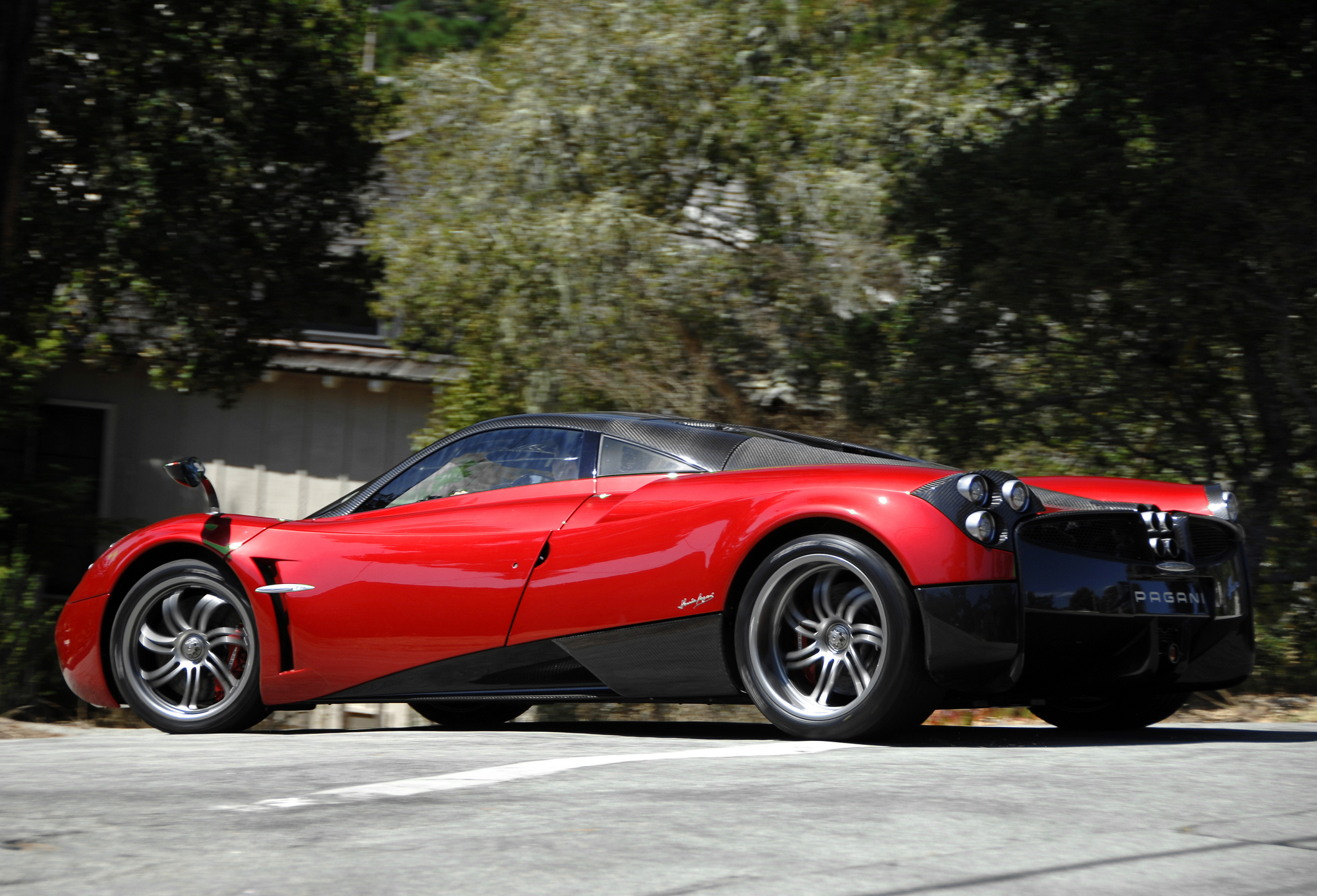 144014 download wallpaper pagani, cars, red, side view, supercar, huayra screensavers and pictures for free