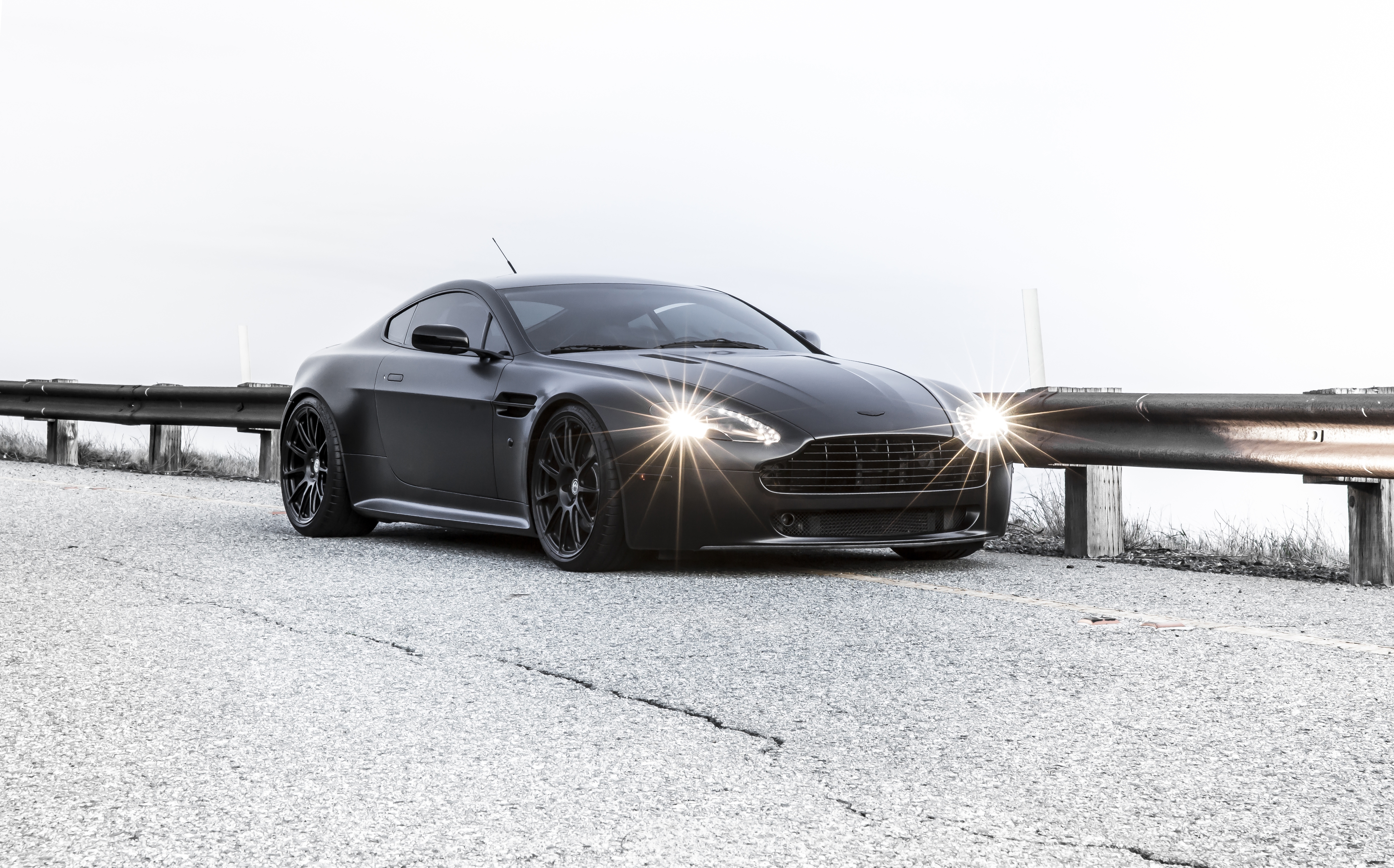 51899 download wallpaper aston martin, cars, black, vantage, bump stop, the screensavers and pictures for free
