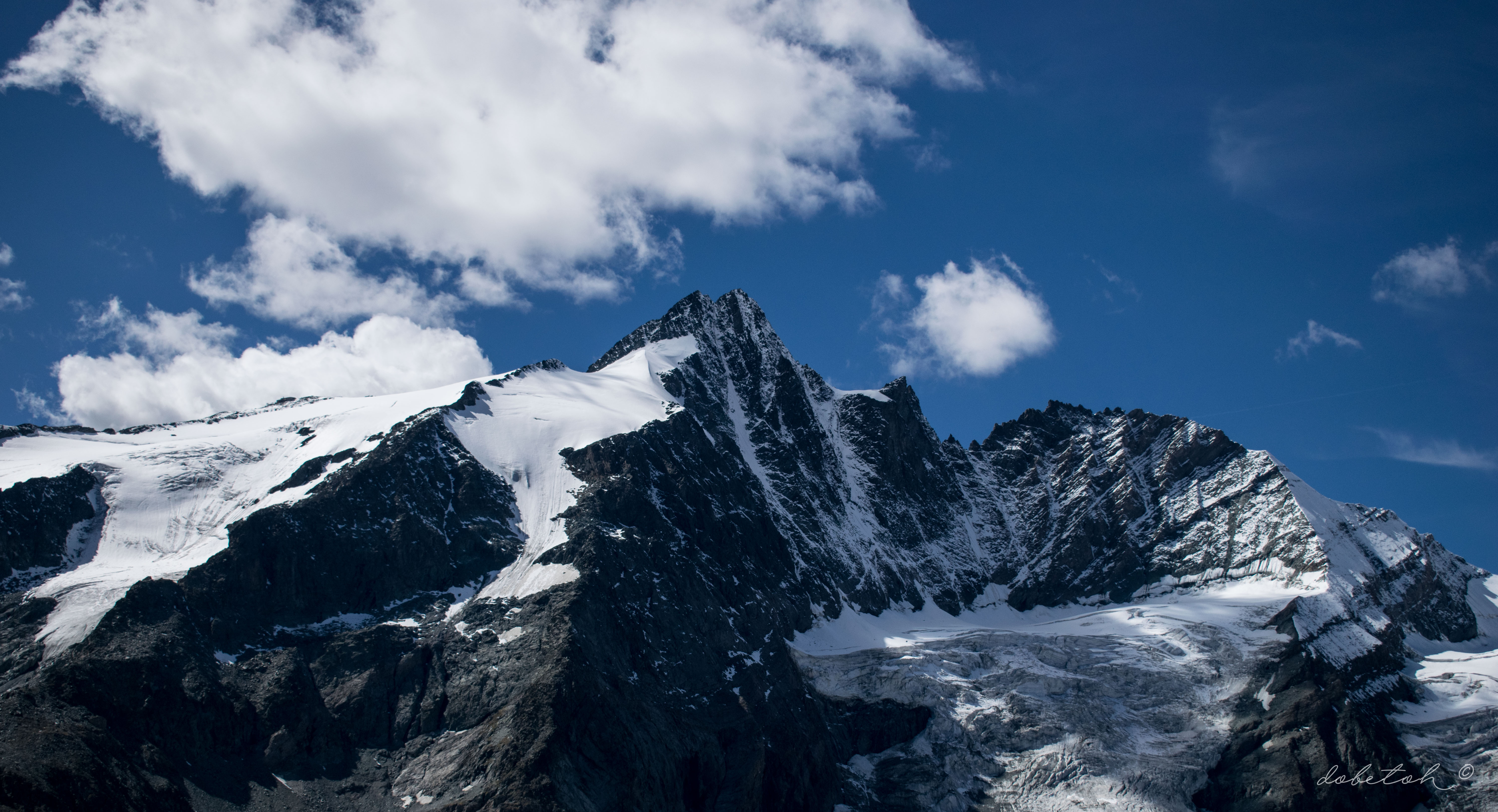 108245 скачать обои вершина, природа, облака, снег, гора, заснеженный - заставки и картинки бесплатно