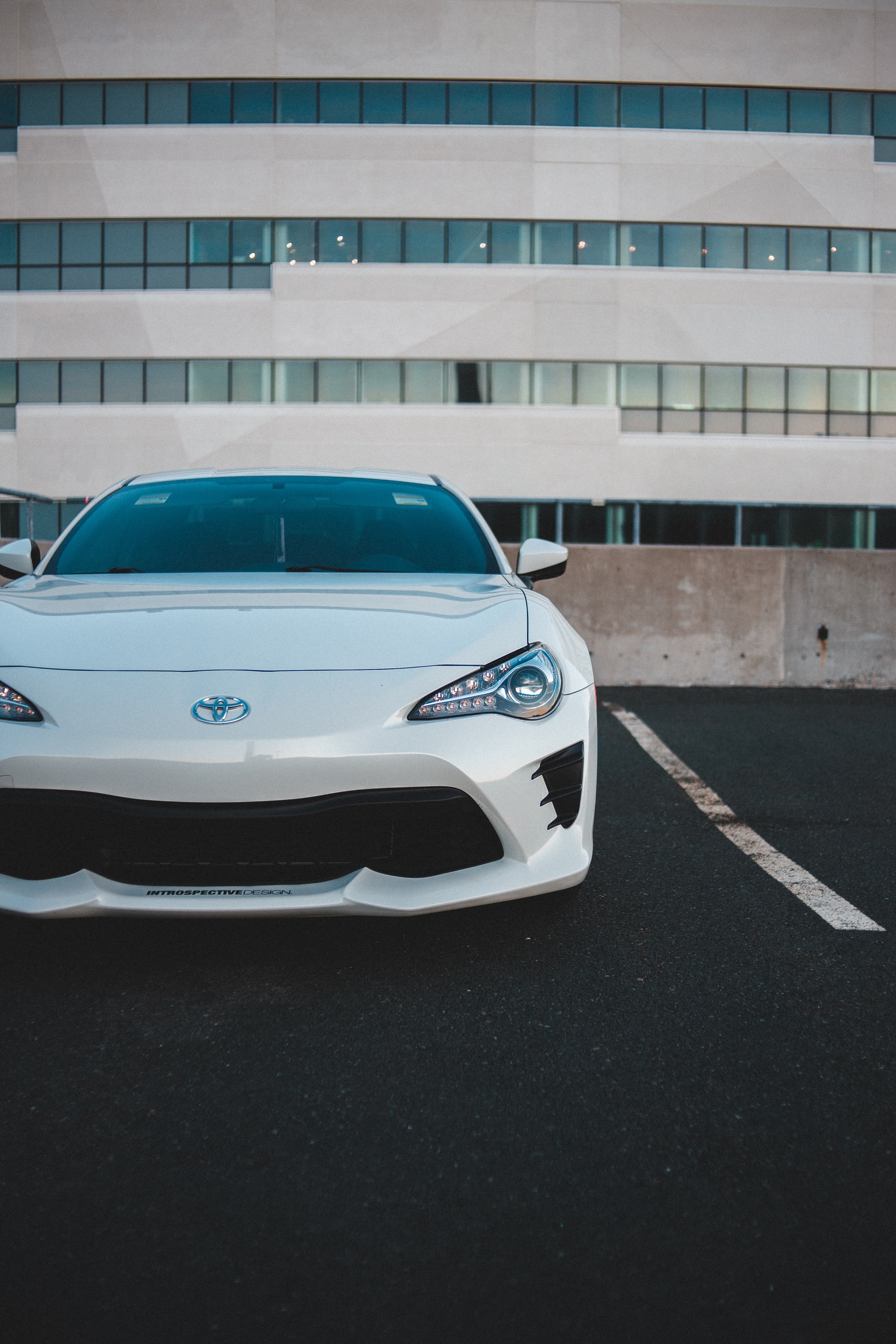 64875 download wallpaper toyota, sports, cars, white, lights, car, front view, sports car, headlights screensavers and pictures for free