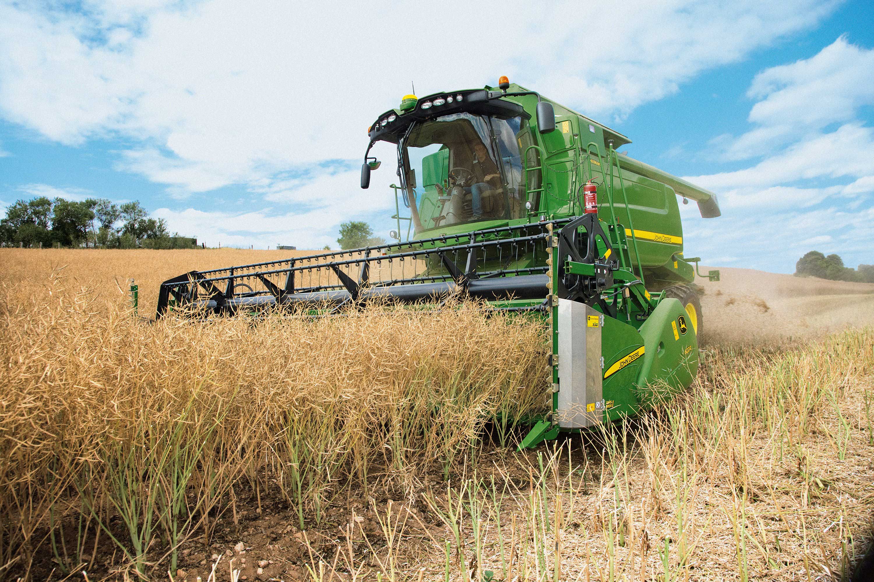 Уборка полей комбайнами. Комбайн зерноуборочный John Deere 3316. Комбайн Джон Дир в поле. Джон Дир комбайн 1048. Комбайн Джон Дир 9640.