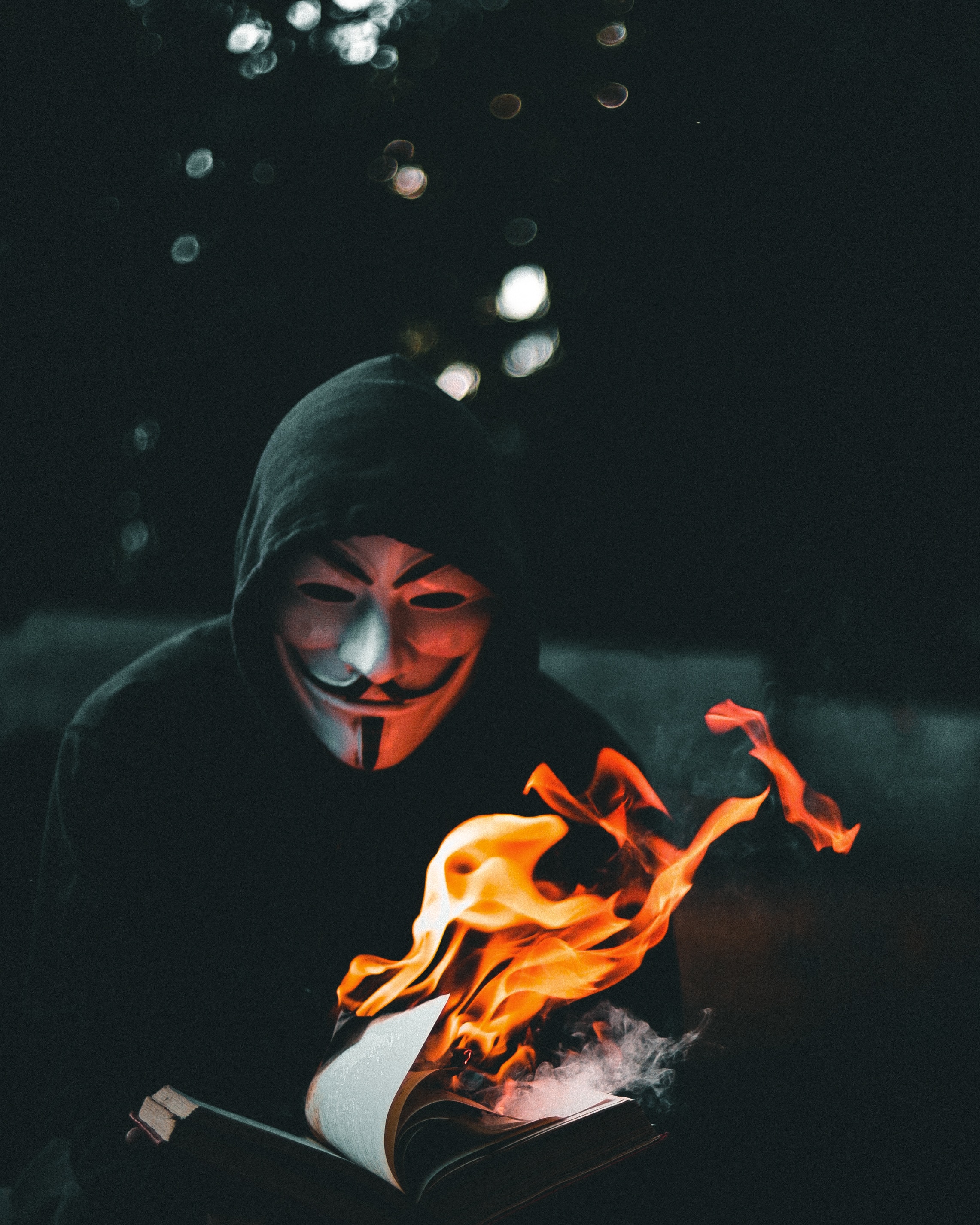79249 Screensavers and Wallpapers Anonymous for phone. Download anonymous, fire, miscellanea, miscellaneous, mask, book pictures for free