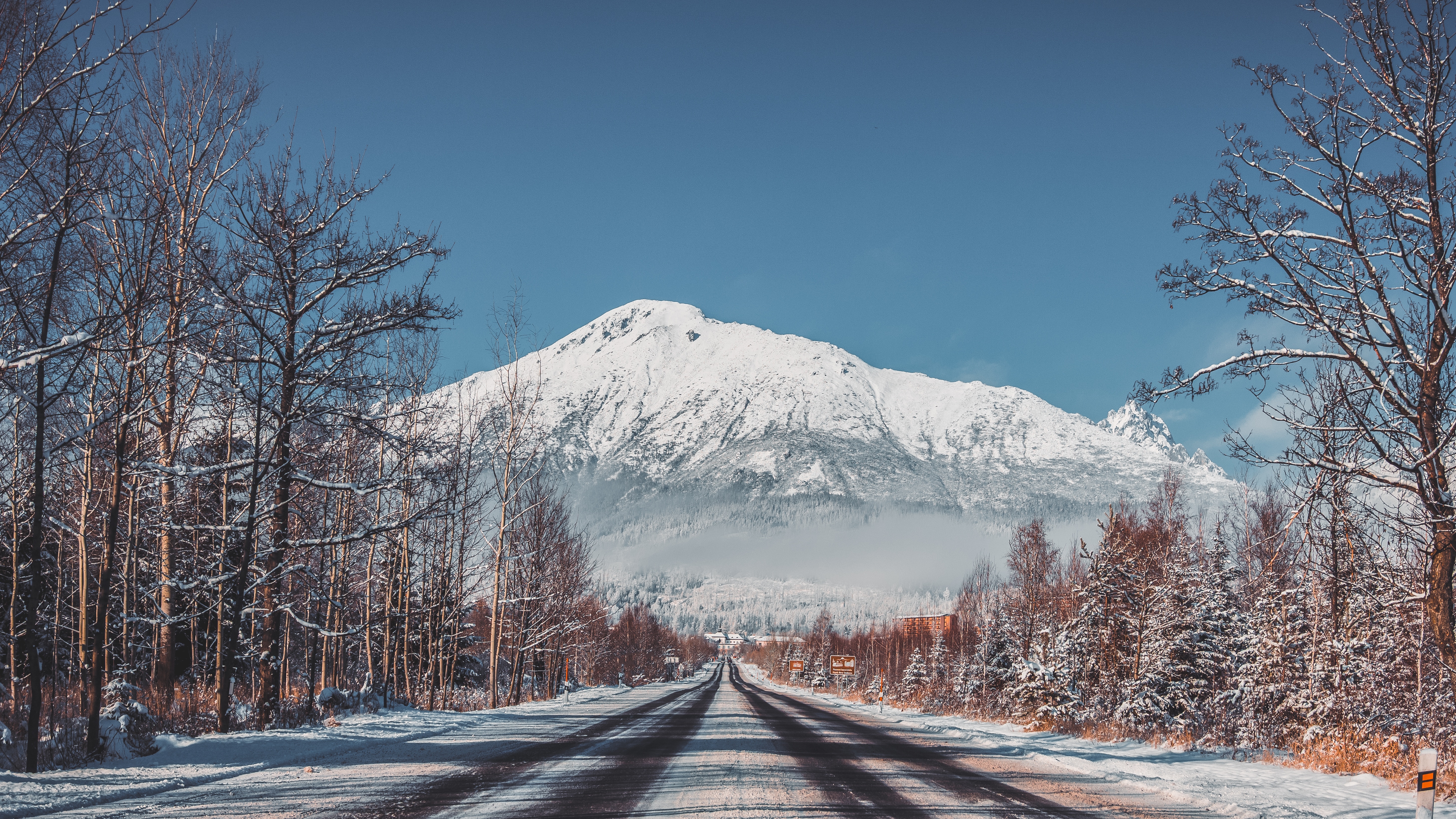 70893 download wallpaper mountains, landscape, winter, nature, trees, snow, road screensavers and pictures for free