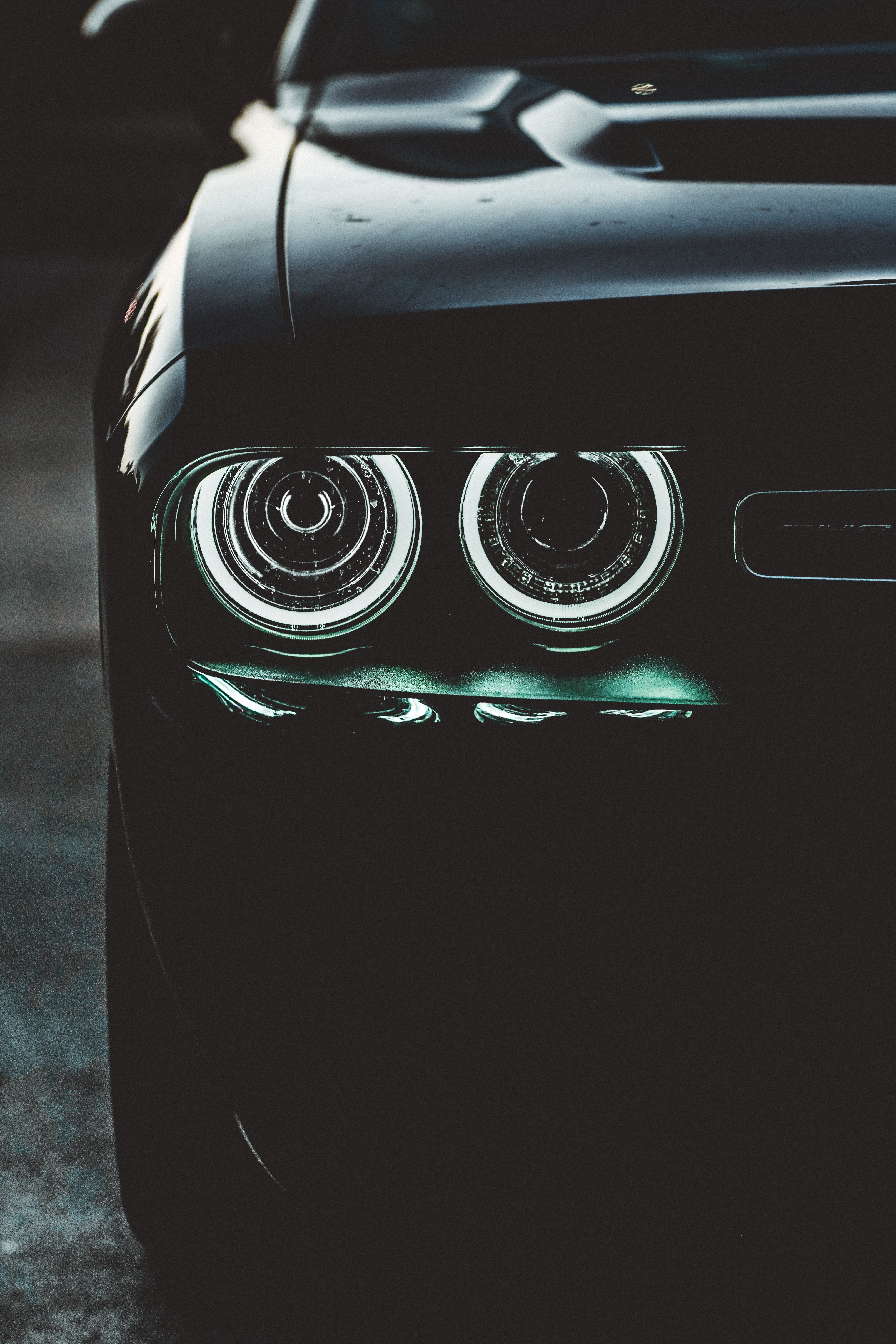 124672 download wallpaper dark, cars, black, lights, car, machine, backlight, illumination, headlights screensavers and pictures for free