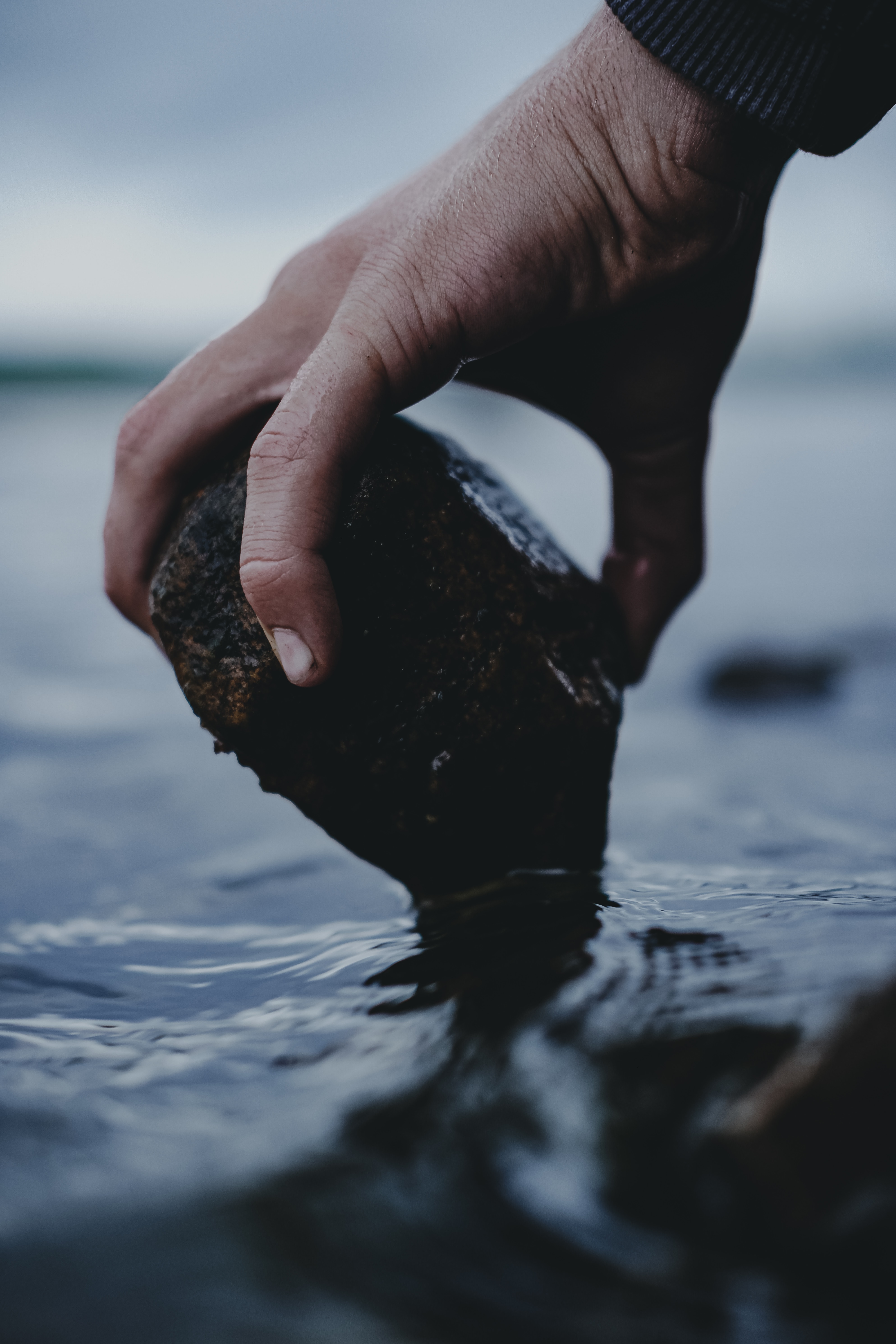 Download mobile wallpaper Miscellaneous, Water, Rock, Hand, Miscellanea, Wet, Stone for free.