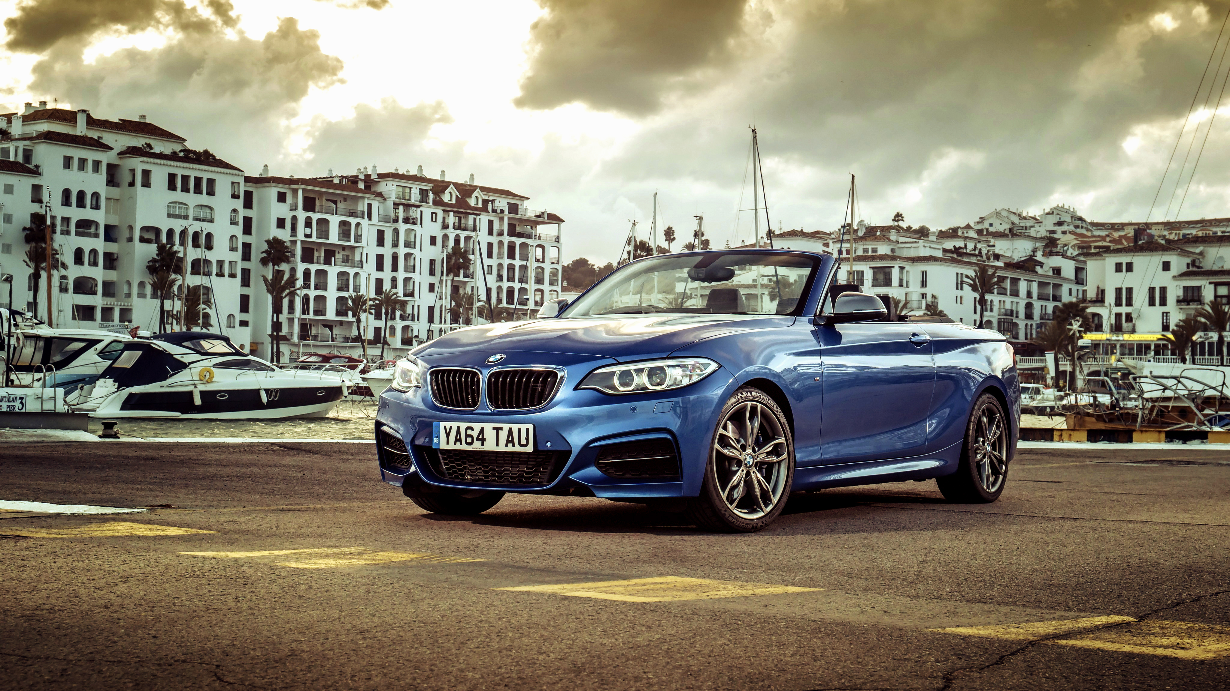 130846 Screensavers and Wallpapers Cabriolet for phone. Download bmw, cars, blue, cabriolet, wharf, berth, 2015, uk-spec, m235i, f23 pictures for free