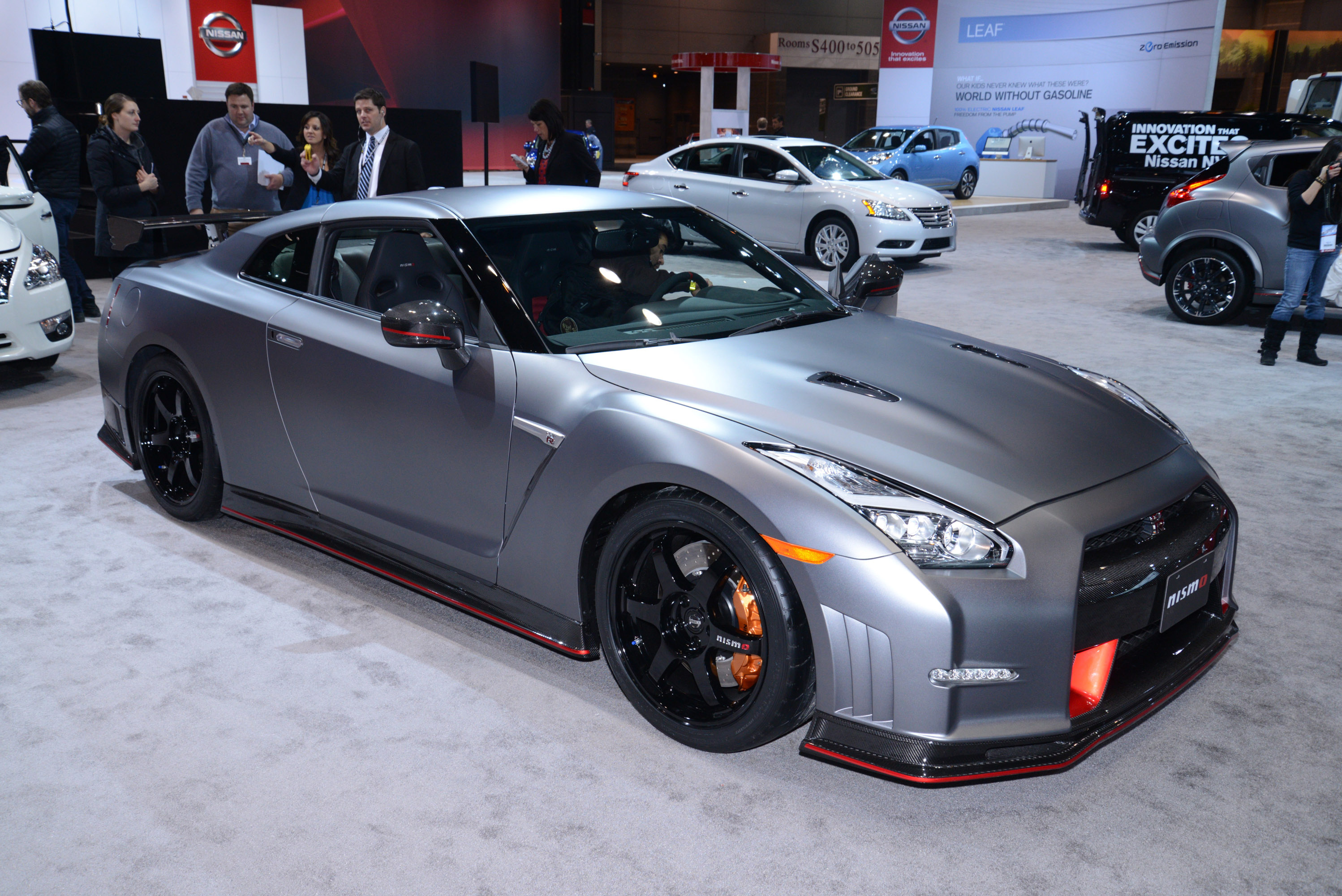 146932 download wallpaper car showroom, nissan, cars, 2014, motor show, chicago, nismo, gt-r, gtr screensavers and pictures for free
