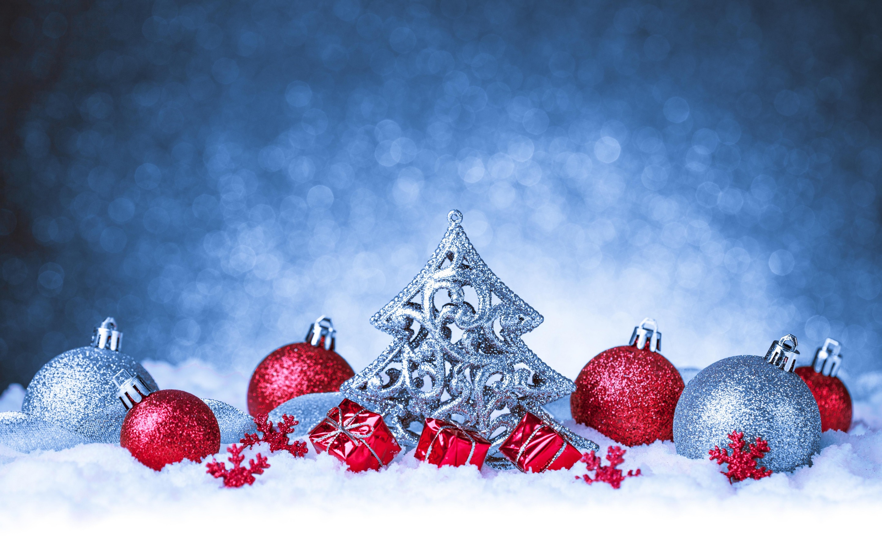 Silver holiday, snow, red, christmas ornaments Free Stock Photos