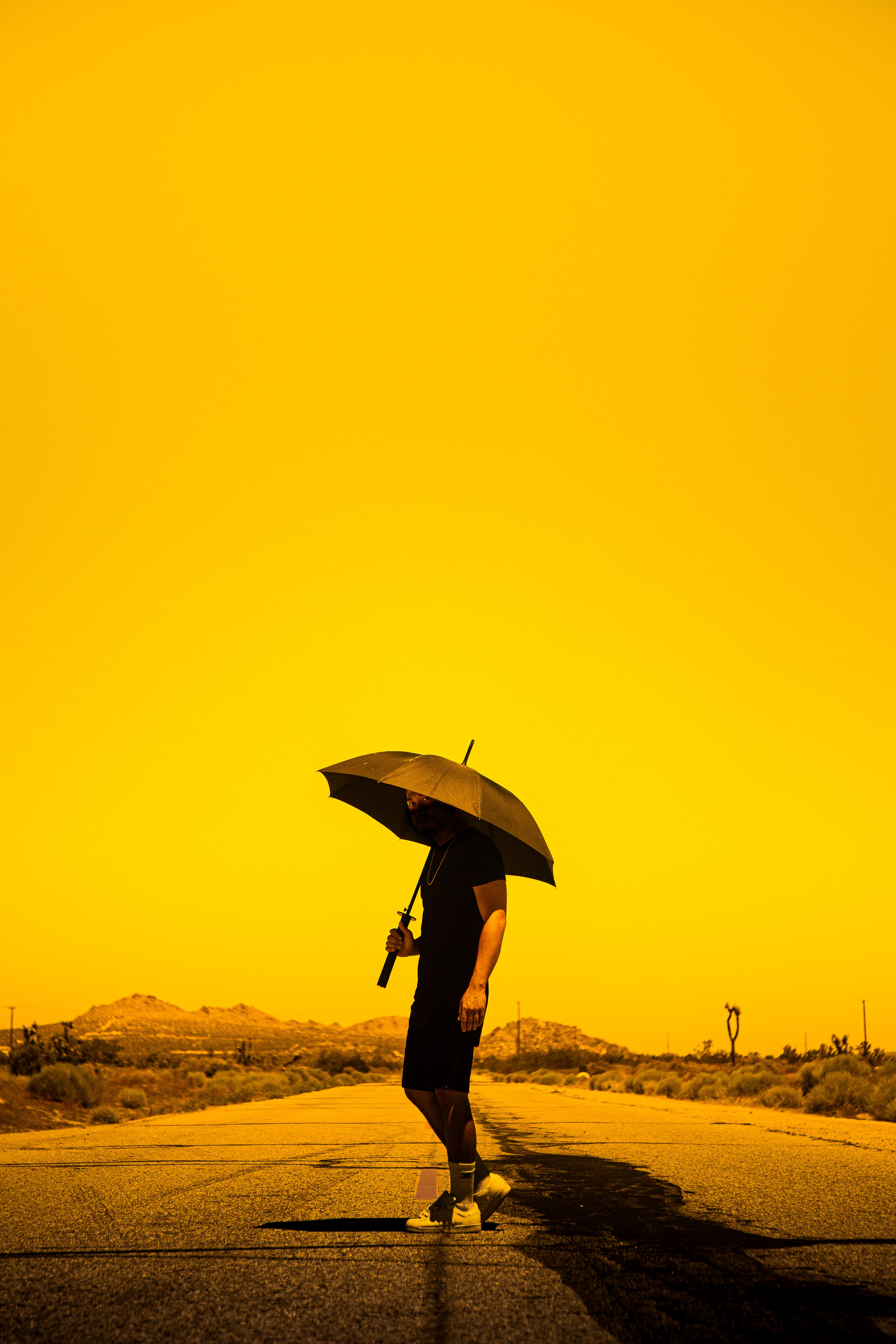 umbrella, sunset, miscellanea, miscellaneous, road, man, human, person phone wallpaper
