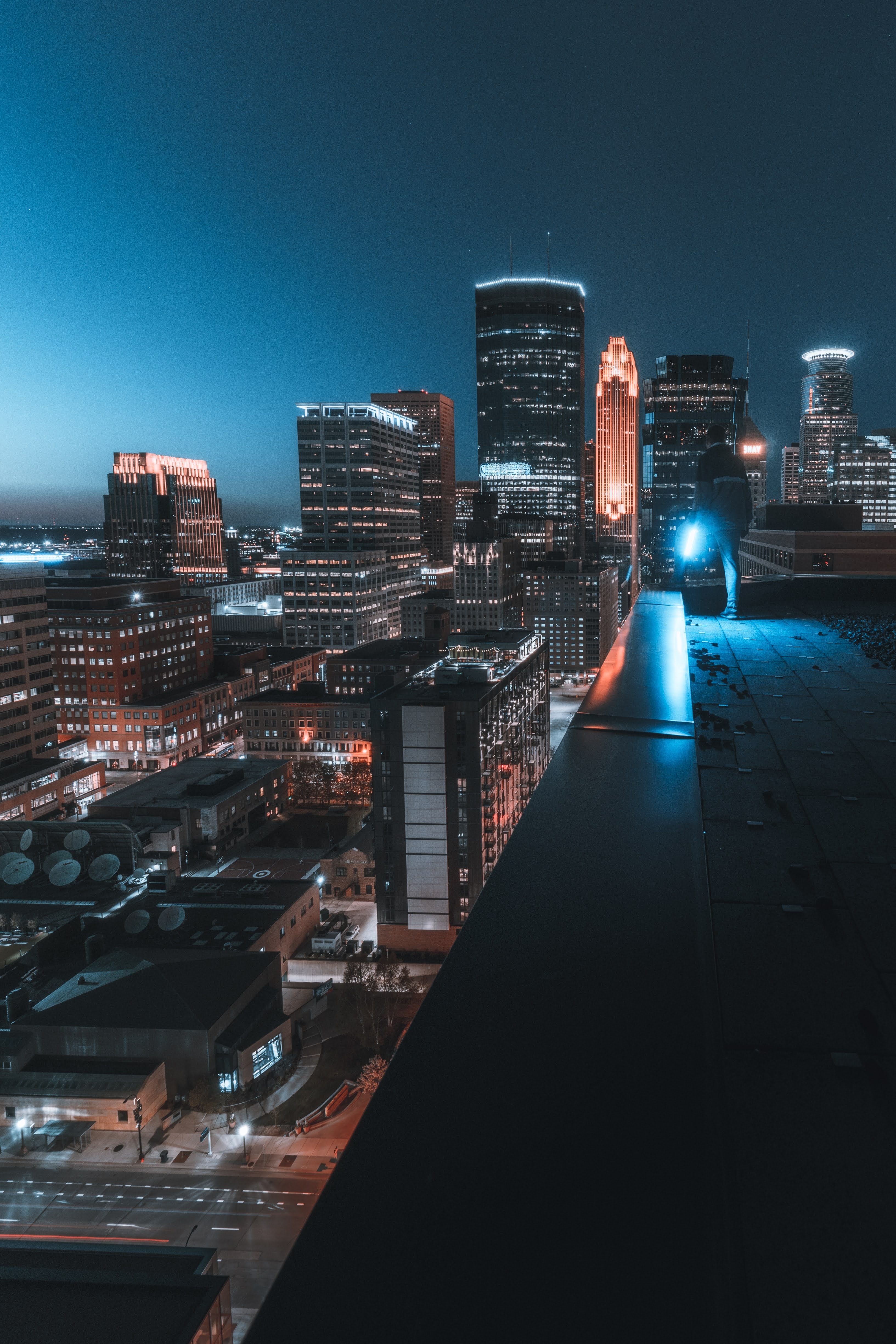 person, city, building, night Vertical Wallpapers