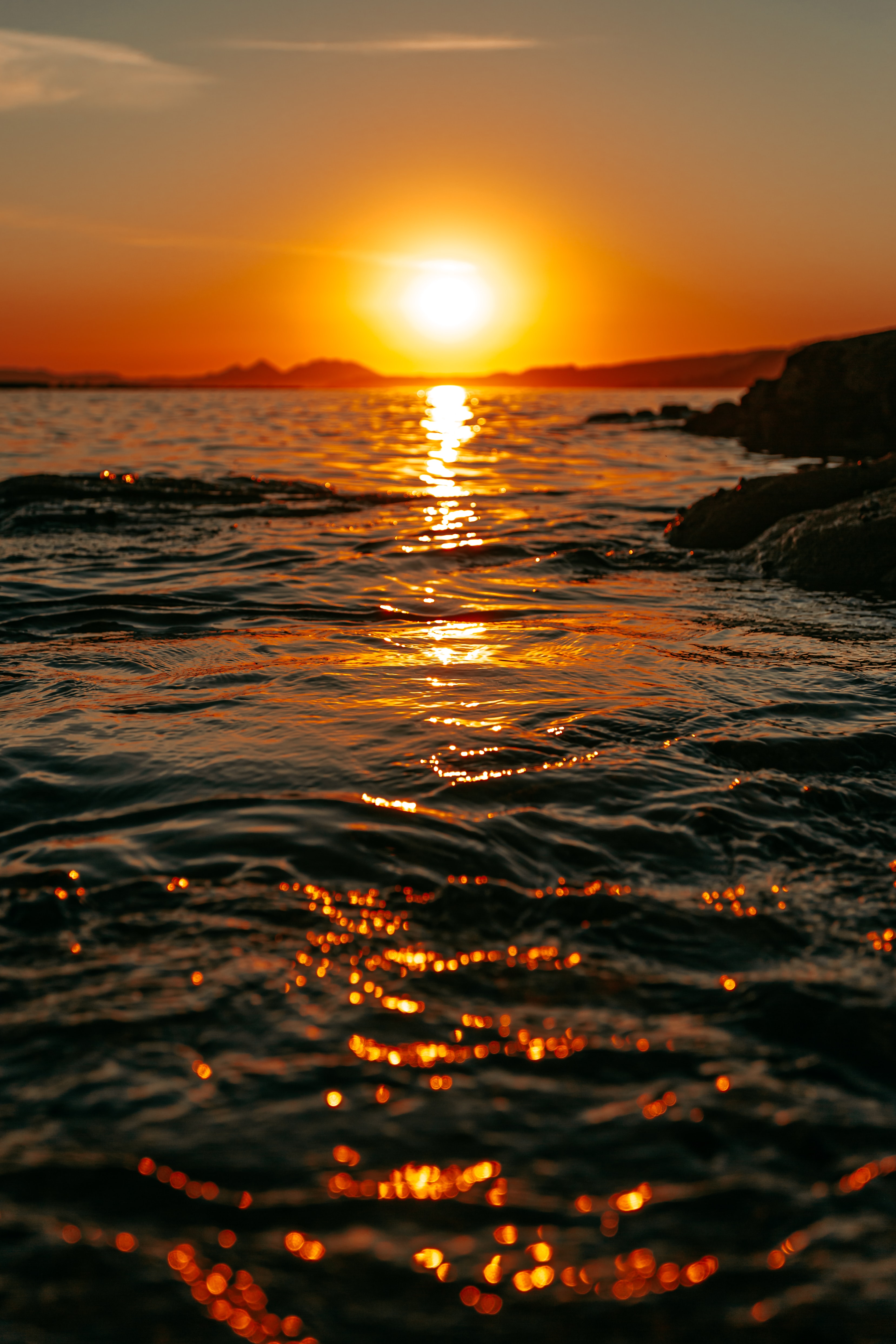 sky, nature, sunset, sea, rocks, glare Smartphone Background
