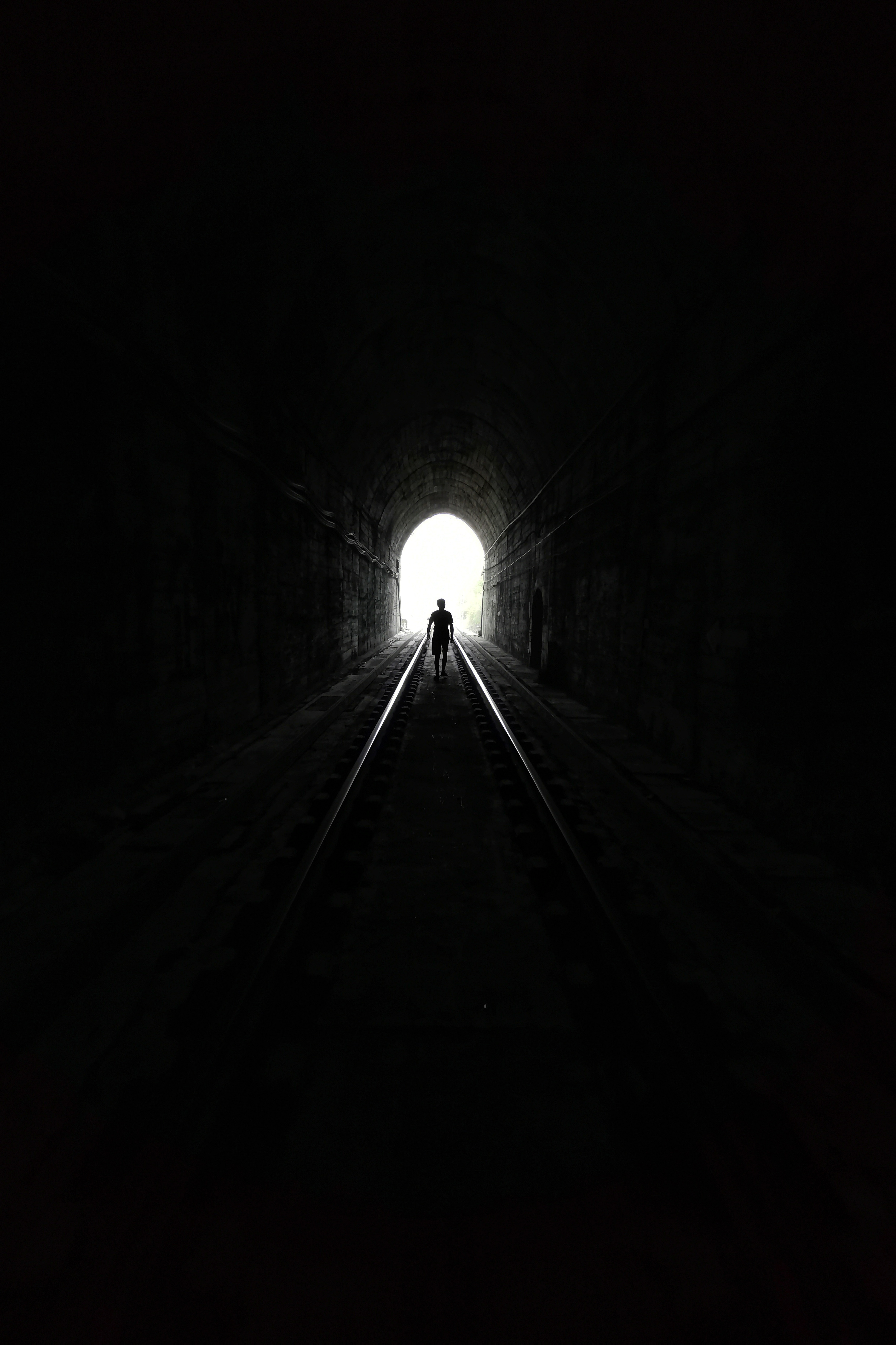 Download mobile wallpaper Chb, Tunnel, Bw, Person, Silhouette, Human for free.
