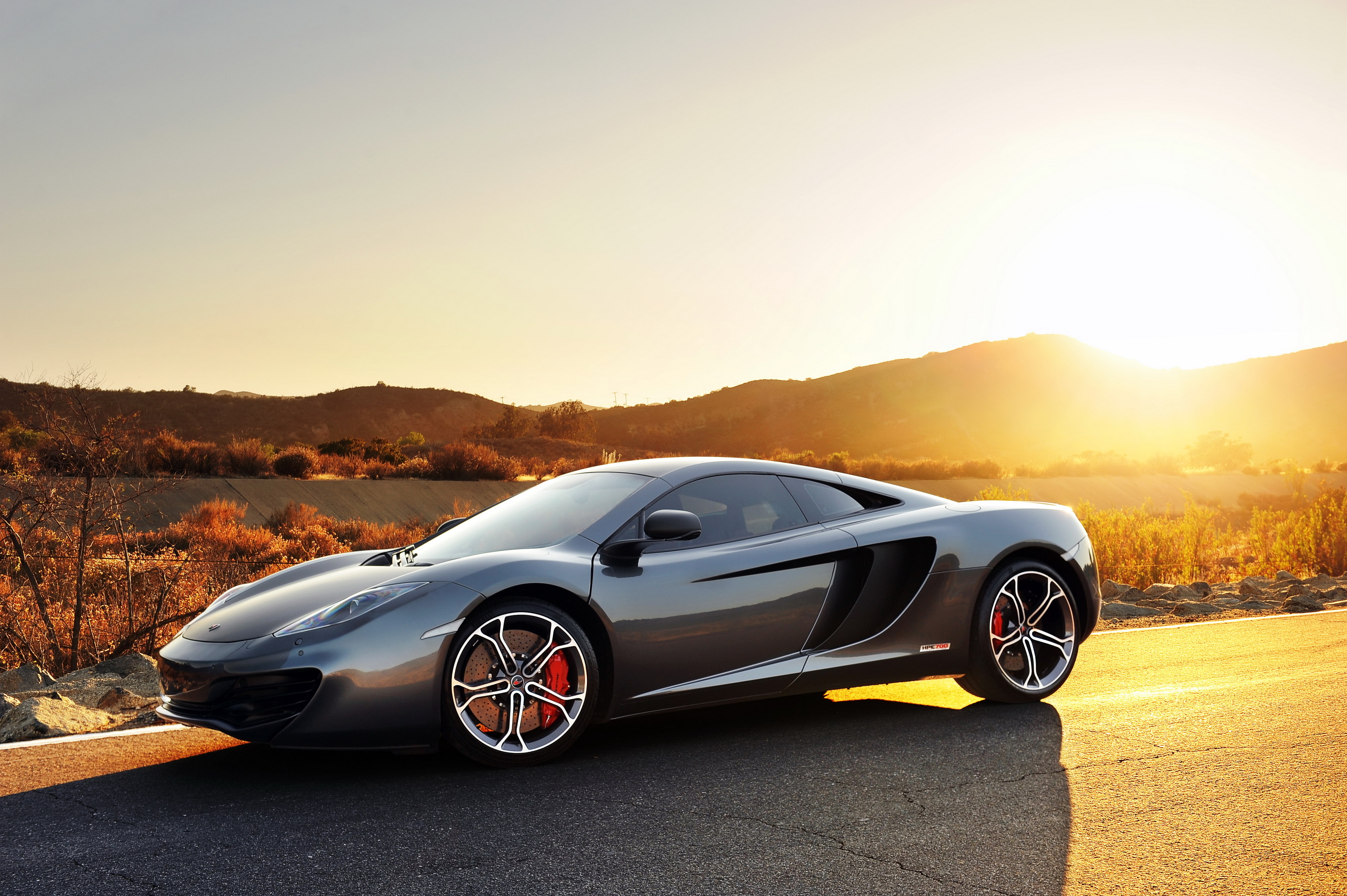 109531 download wallpaper supercar, cars, sports, sunset, mclaren, car, grey, mp4-12c, kar, cirque screensavers and pictures for free