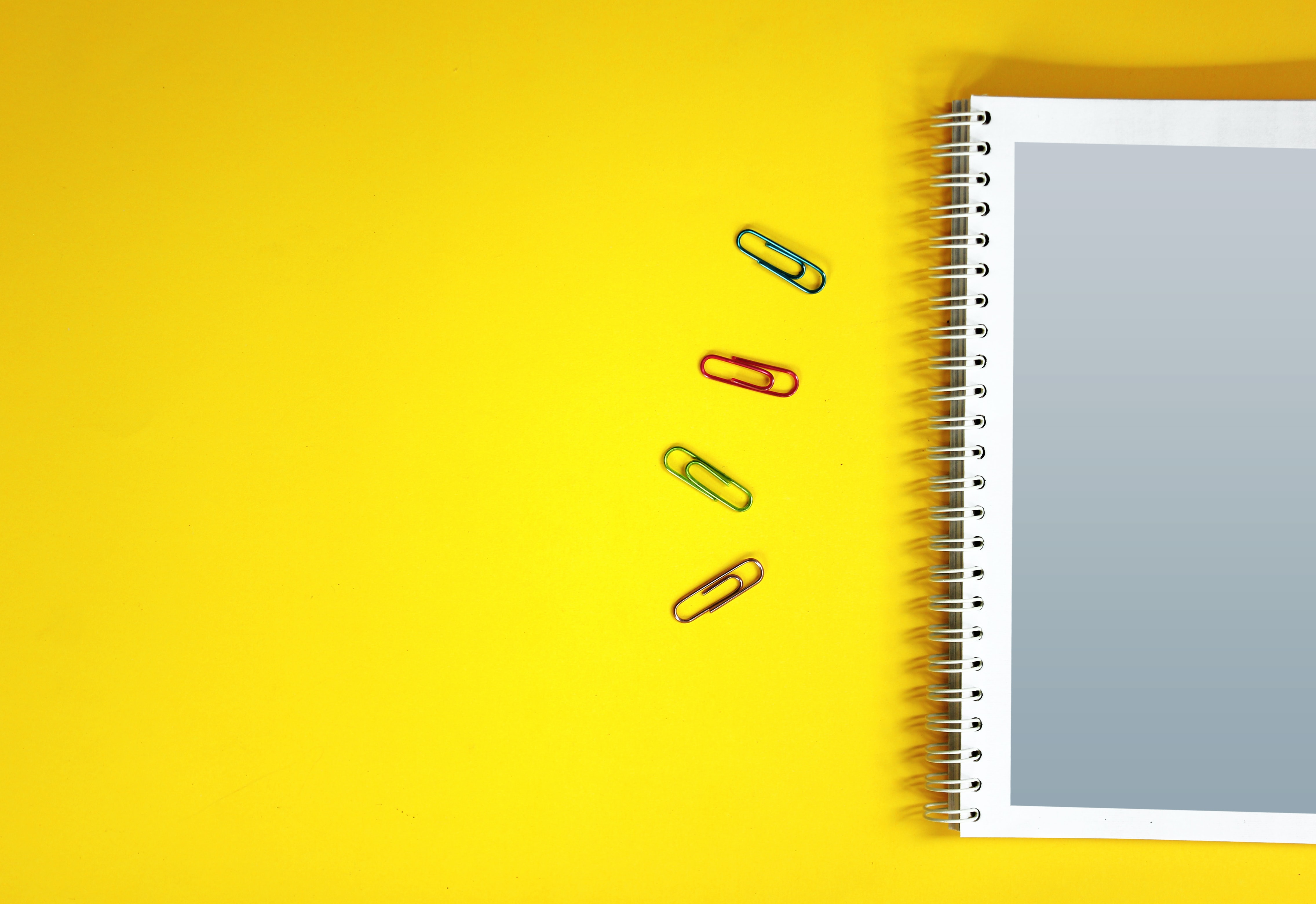 yellow, miscellanea, miscellaneous, surface, notebook, notepad, paper clip, paper clips HD wallpaper