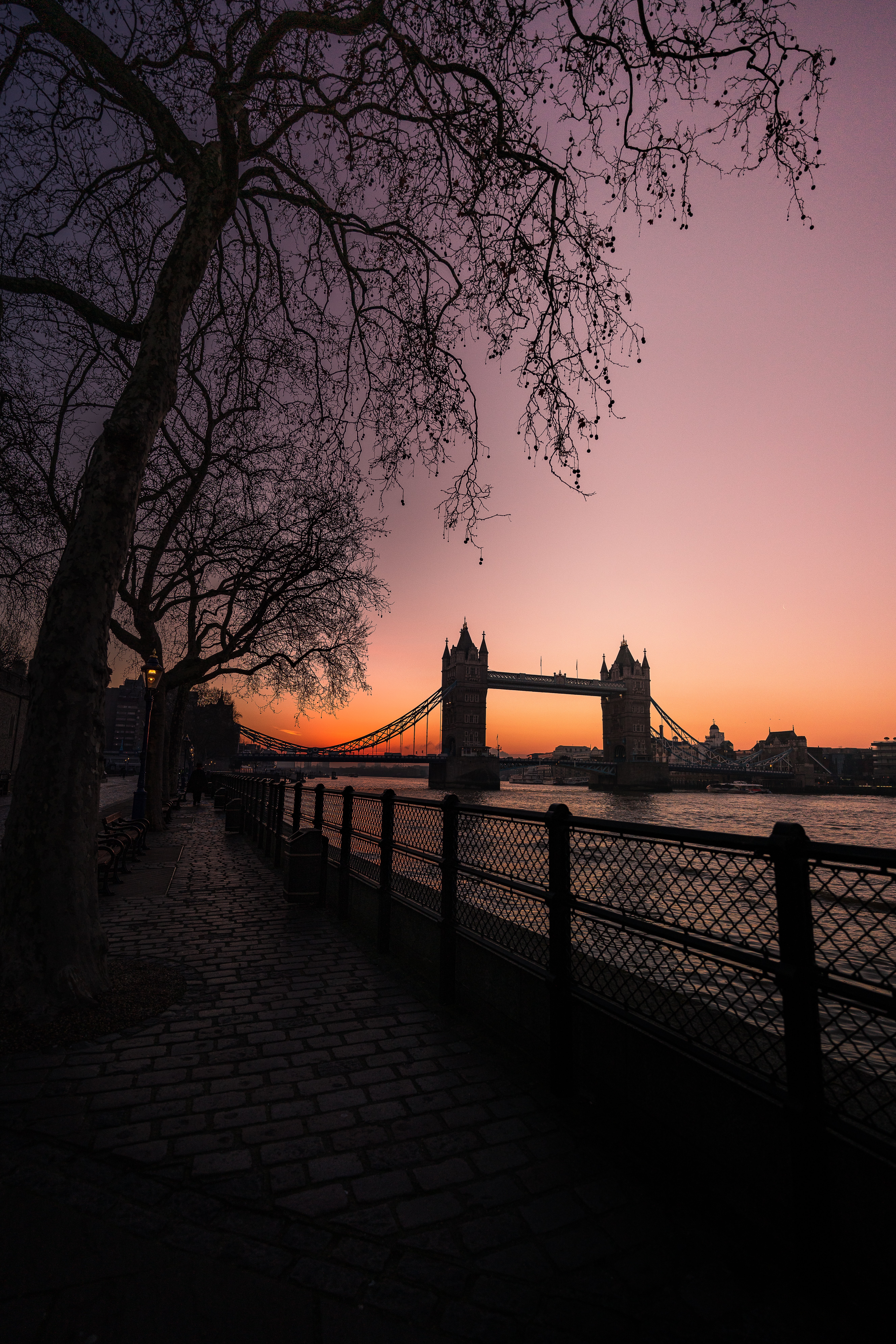 sunset, dark, cities, water, trees, city, bridge, embankment, quay wallpapers for tablet