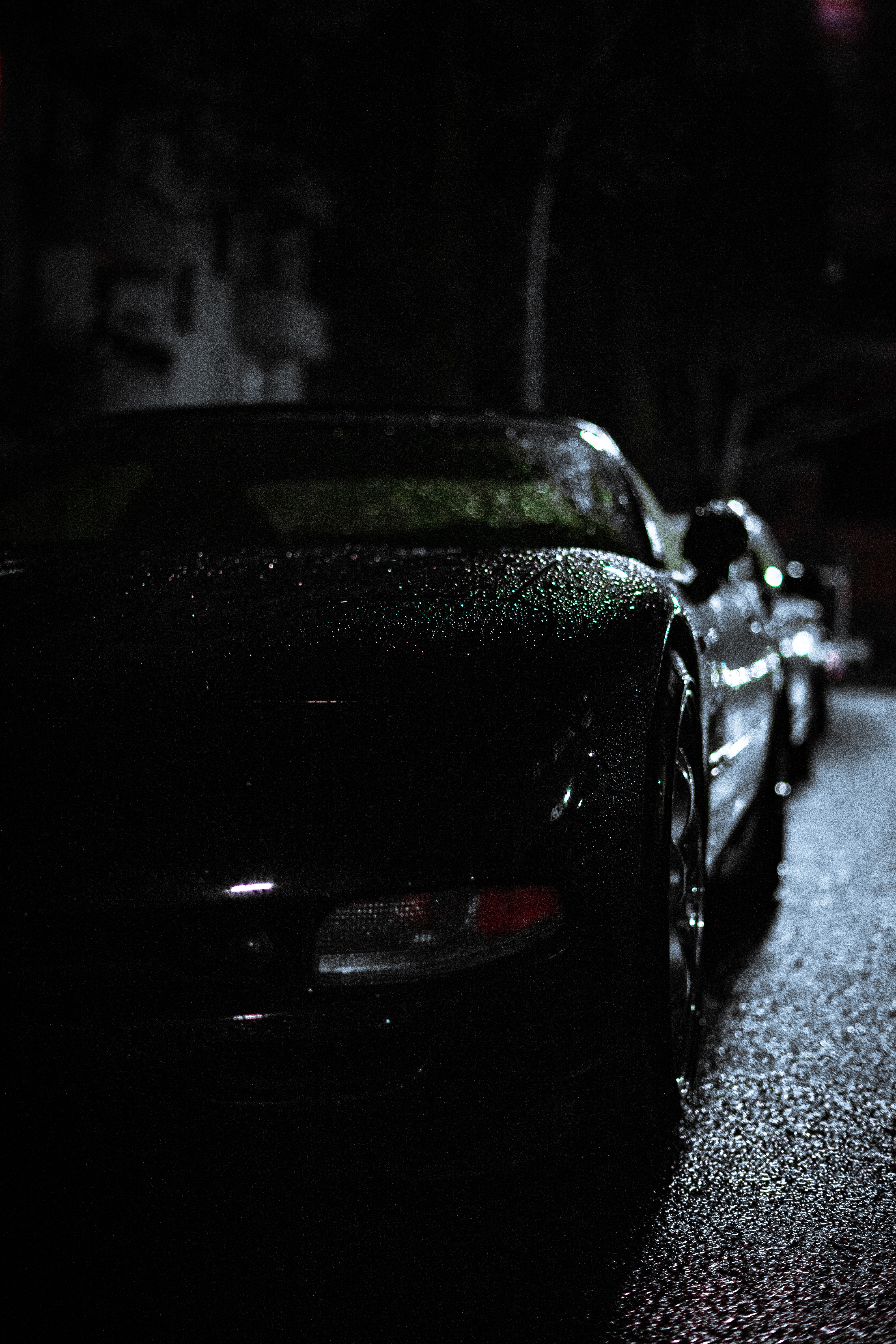 85863 завантажити шпалери дощ, чорний, автомобіль, вид спереду, темрява, фара, фар - заставки і картинки безкоштовно