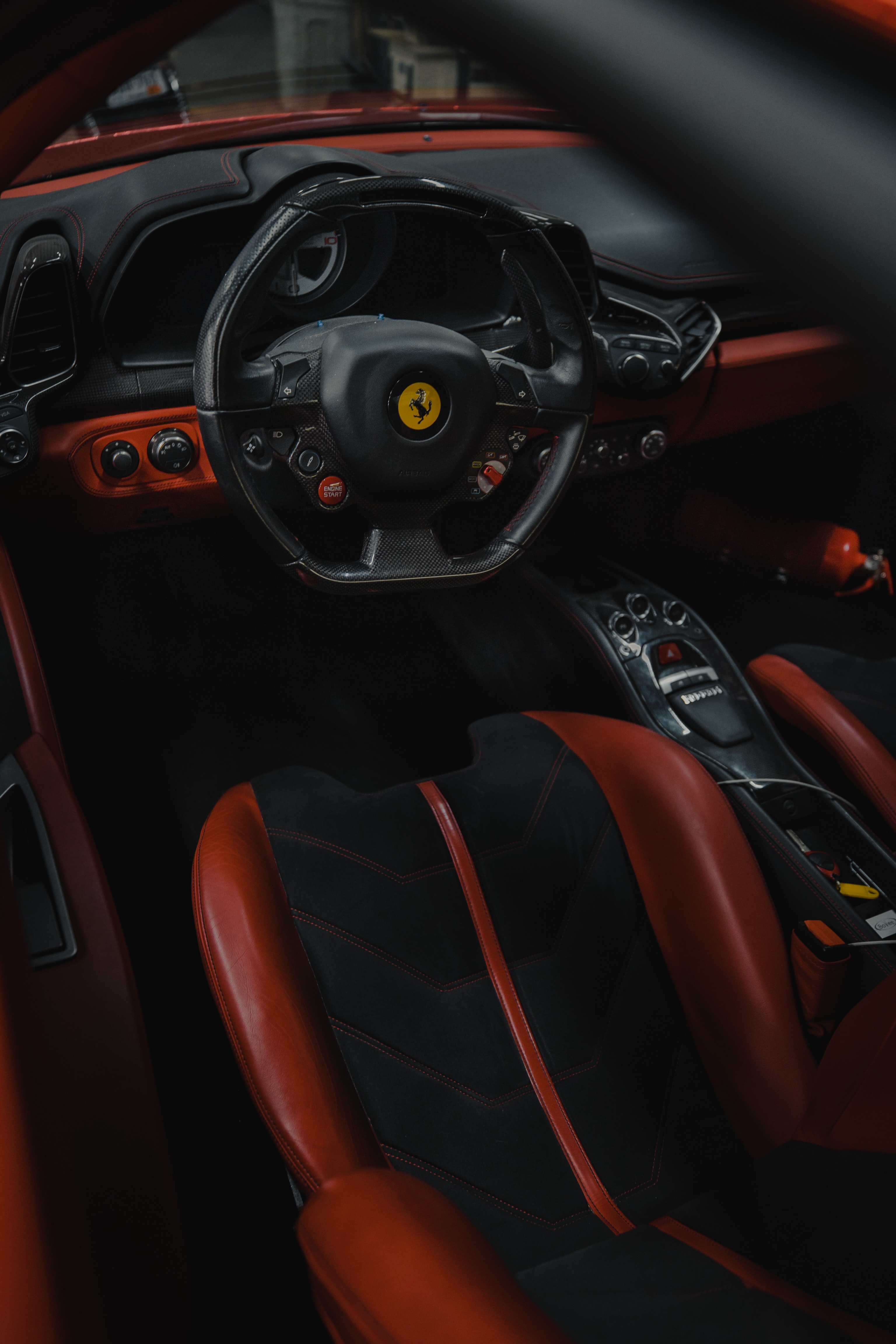 132943 Screensavers and Wallpapers Steering Wheel for phone. Download ferrari, seat, cars, red, car, steering wheel, rudder, salon, sitting pictures for free
