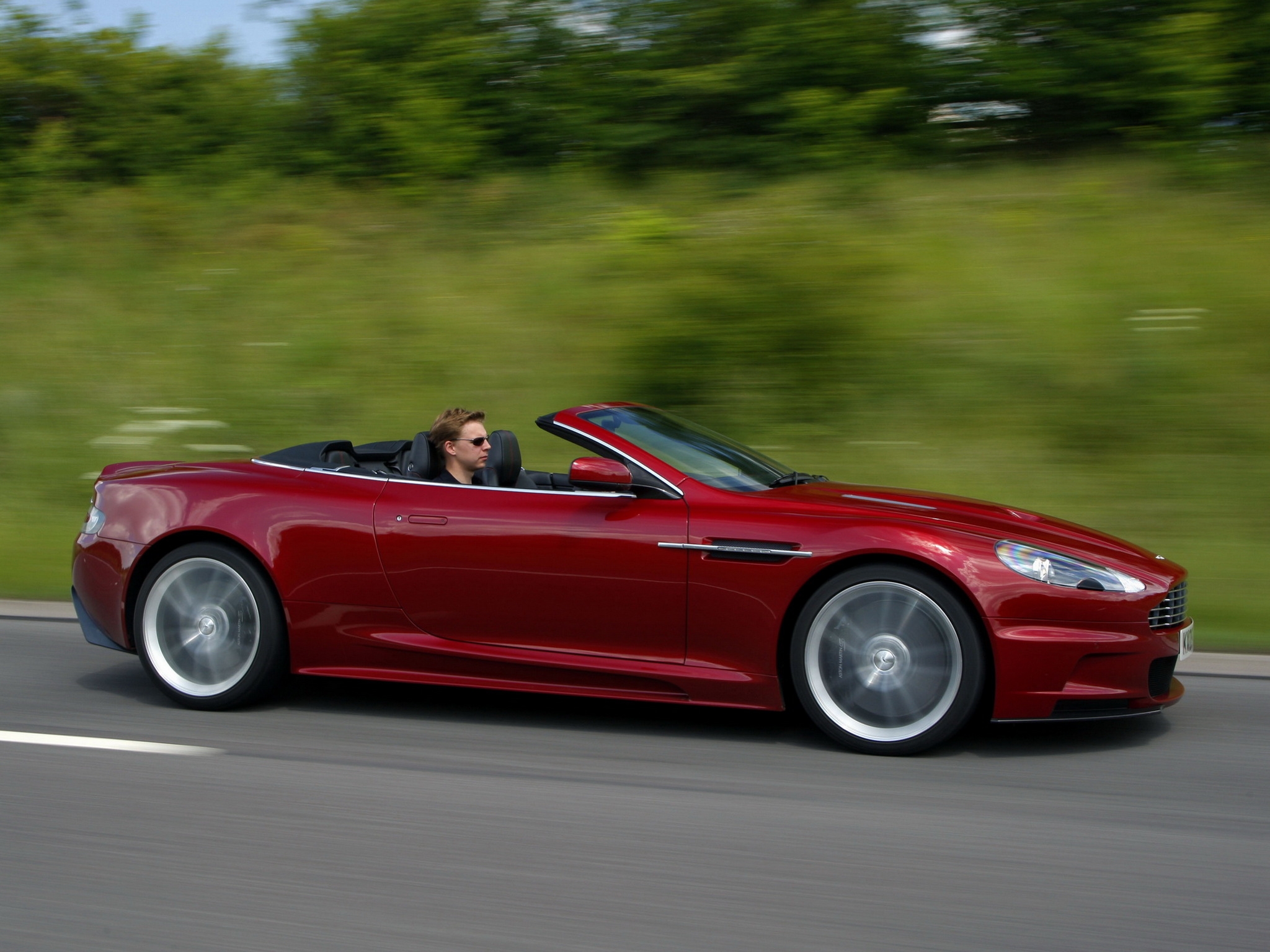 152840 Protetores de tela e papéis de parede Aston Martin em seu telefone. Baixe velocidade, carros, 2009, vista lateral fotos gratuitamente