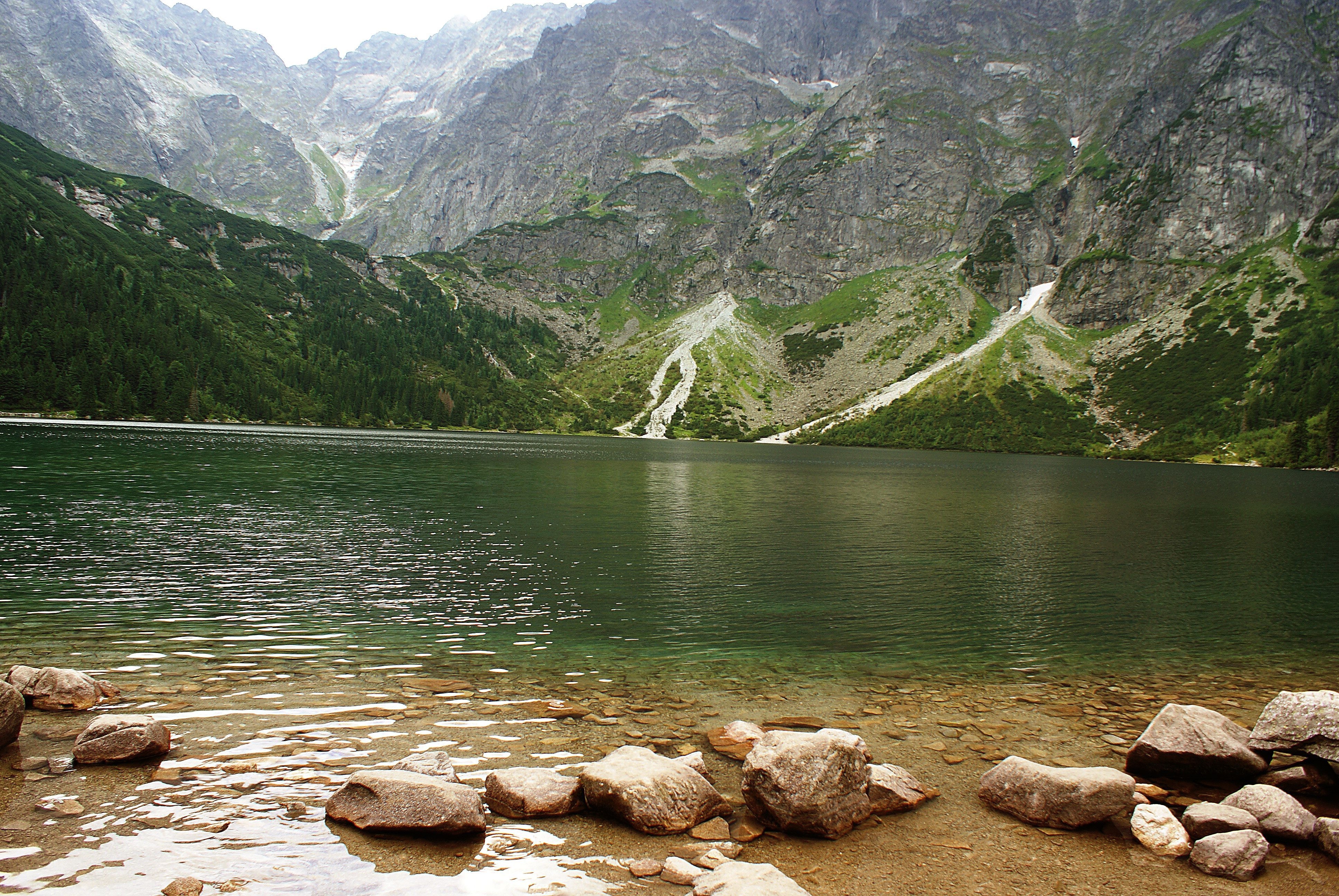101560 download wallpaper lake, stones, nature, mountains screensavers and pictures for free