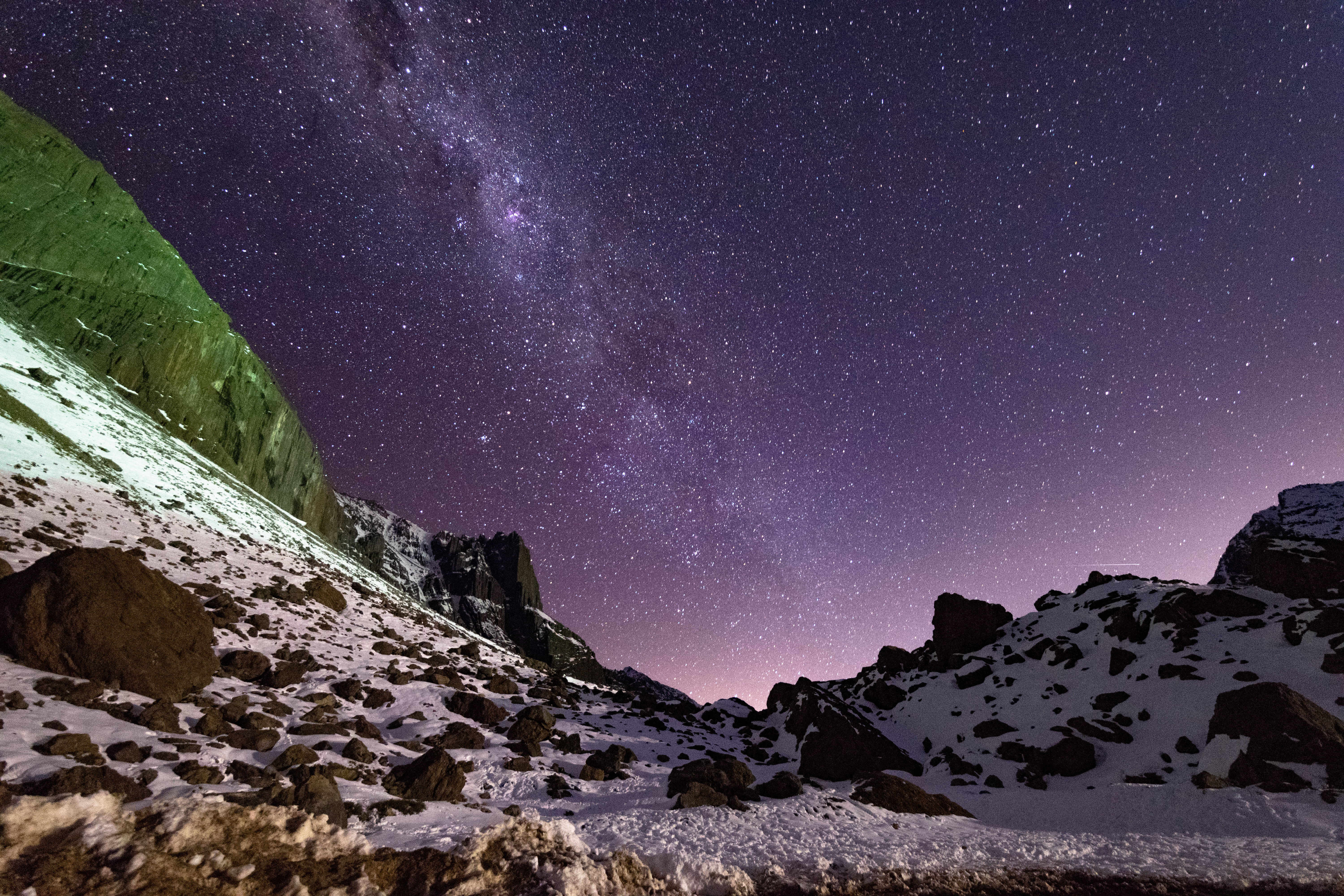 Widescreen image night, rocks, slope, nebula