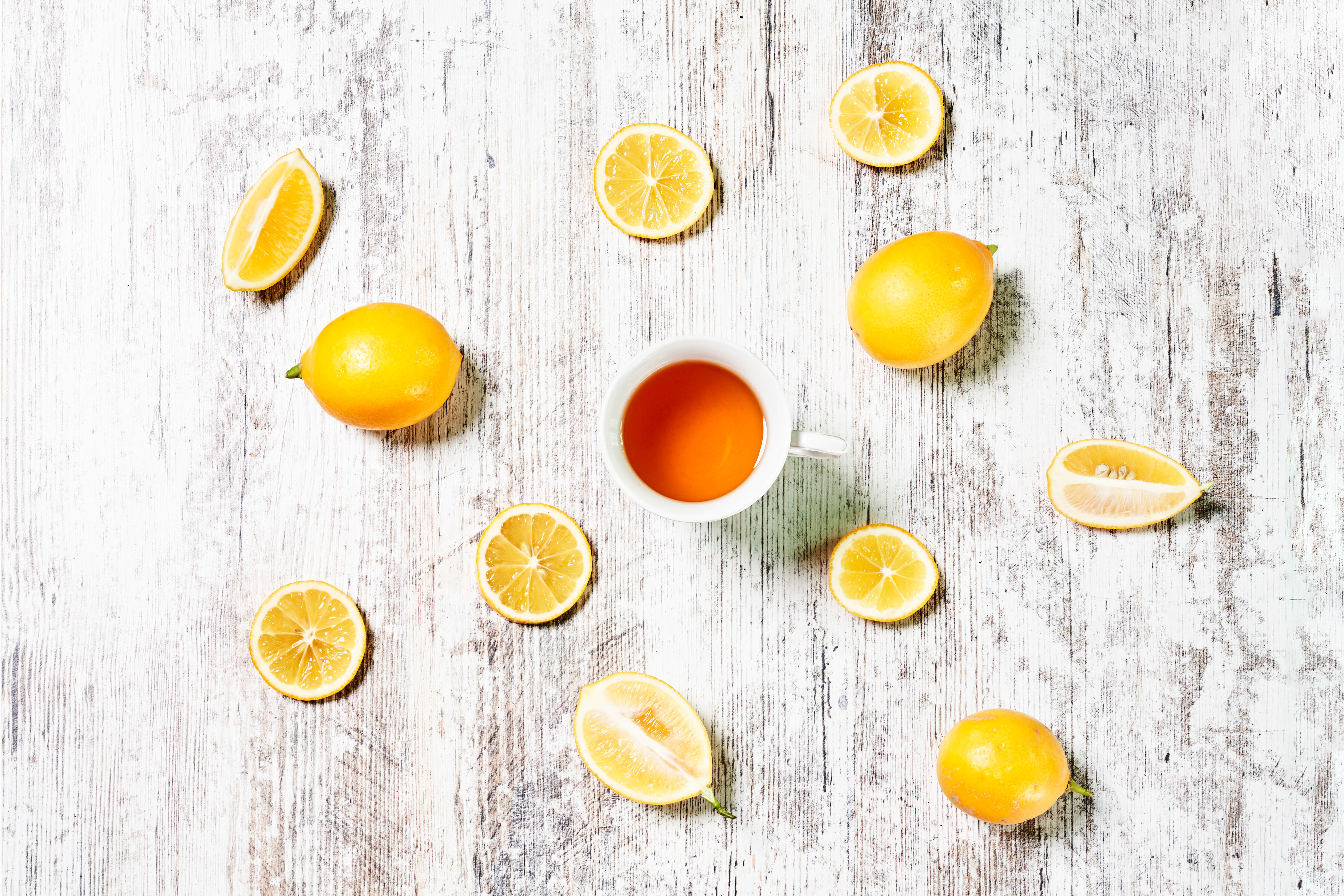 112719 download wallpaper food, lemons, cup, citrus, tea, lobules, slices screensavers and pictures for free