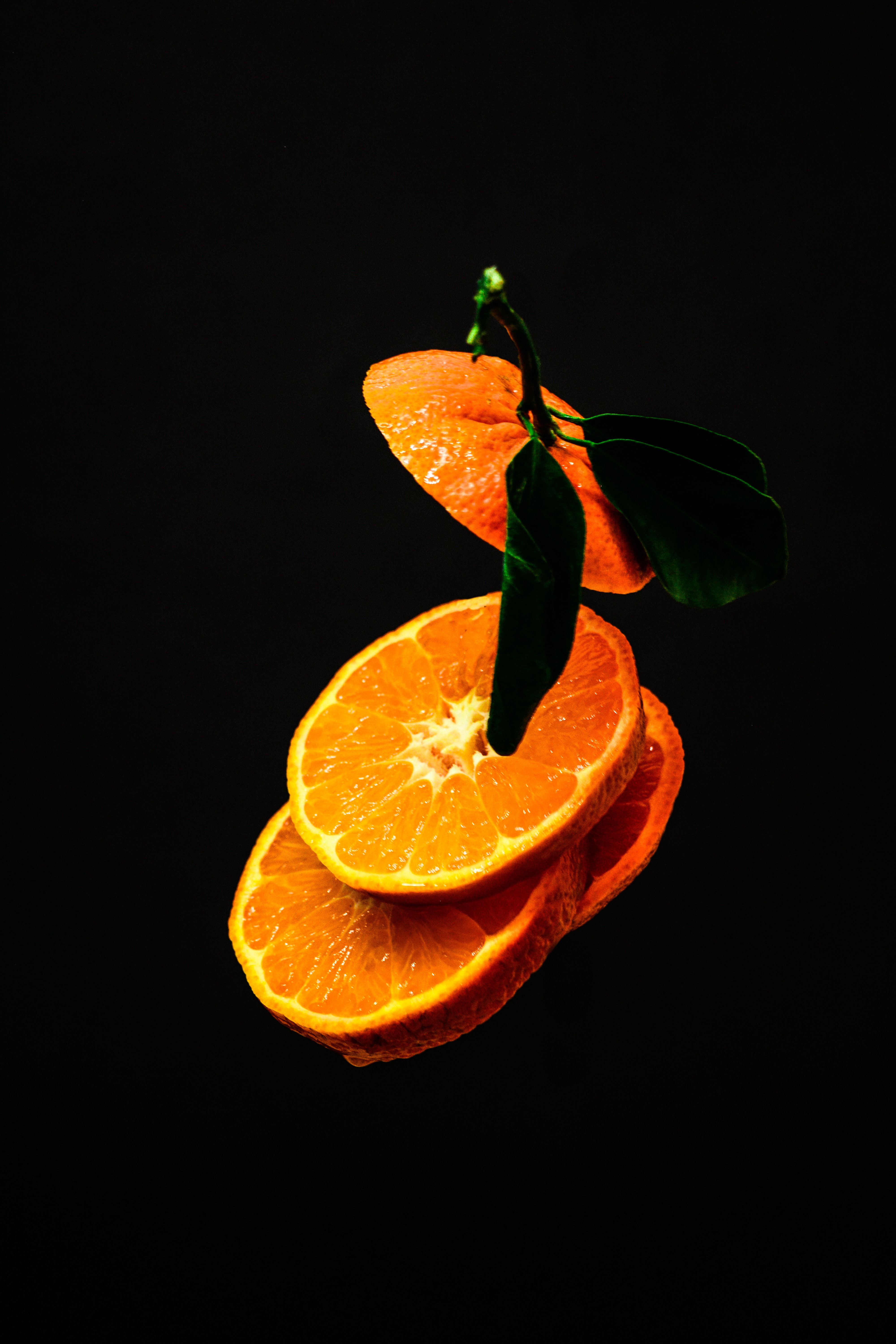 115629 Hintergrundbild herunterladen lebensmittel, orange, dunkel, die frucht, frucht, lobule, nelke - Bildschirmschoner und Bilder kostenlos