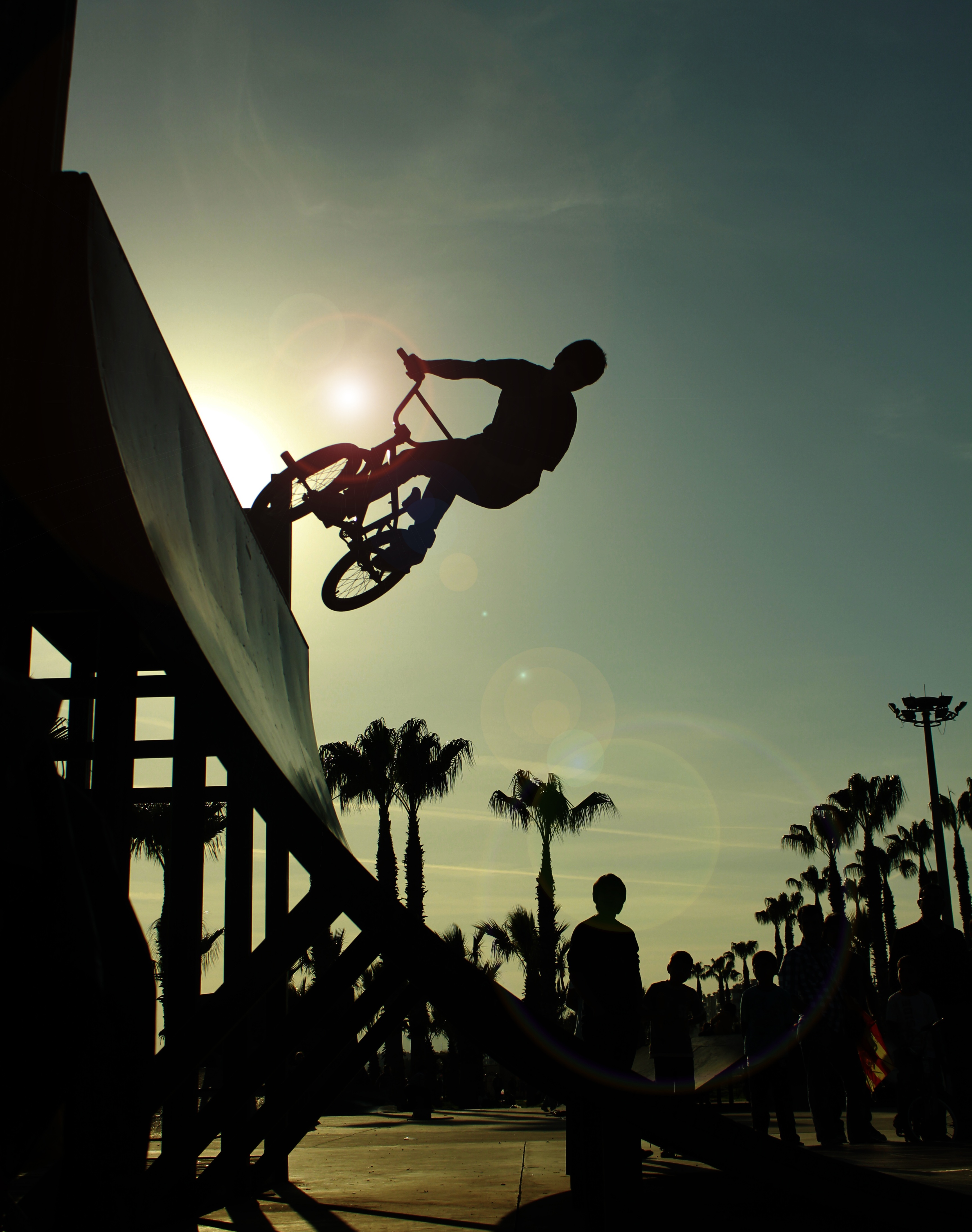 140319 Screensavers and Wallpapers Bicycle for phone. Download sports, silhouette, bounce, jump, bicycle, trick, bmx, ramp, footlights pictures for free