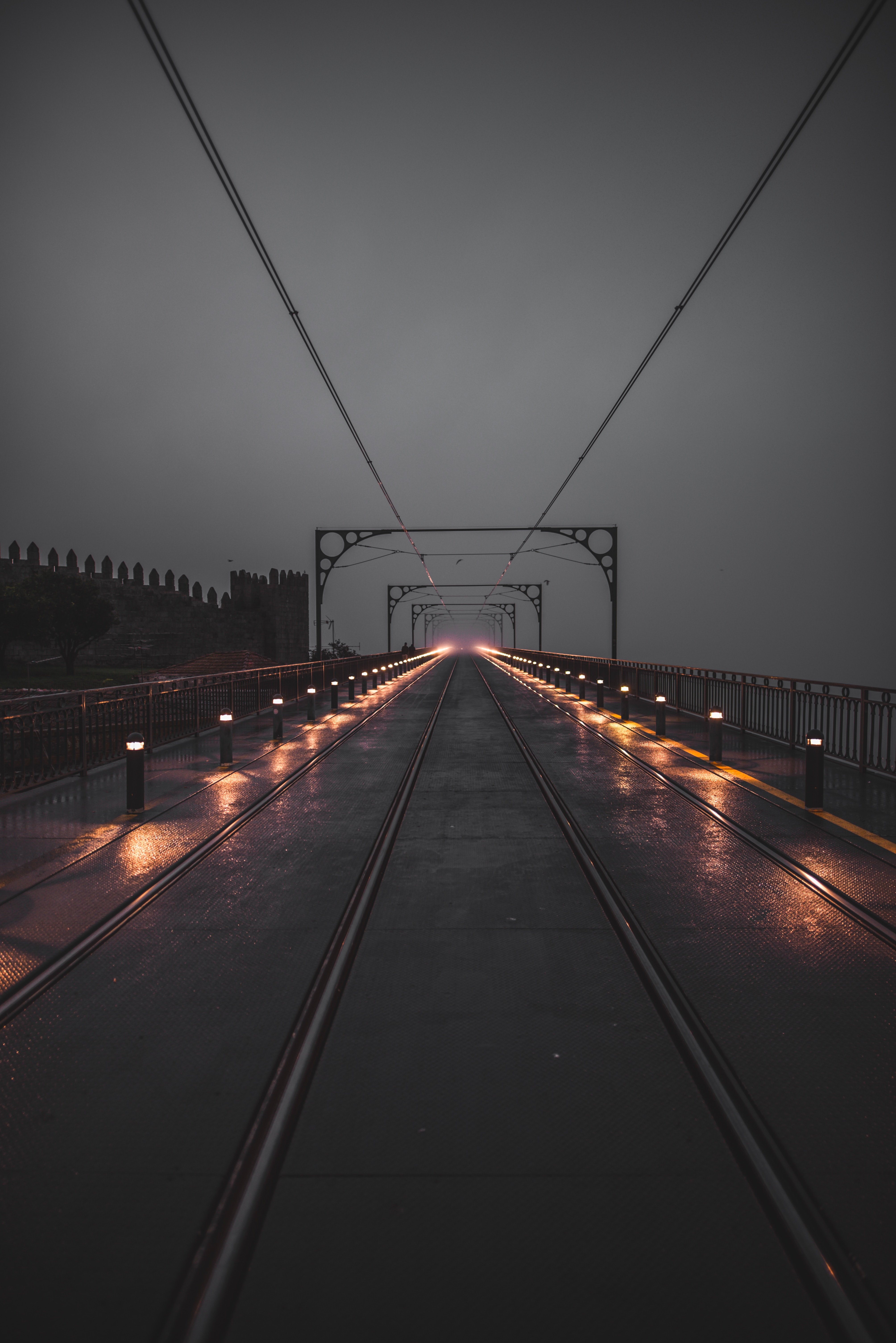 railway, cities, lights, wet, backlight, illumination, rails Phone Background