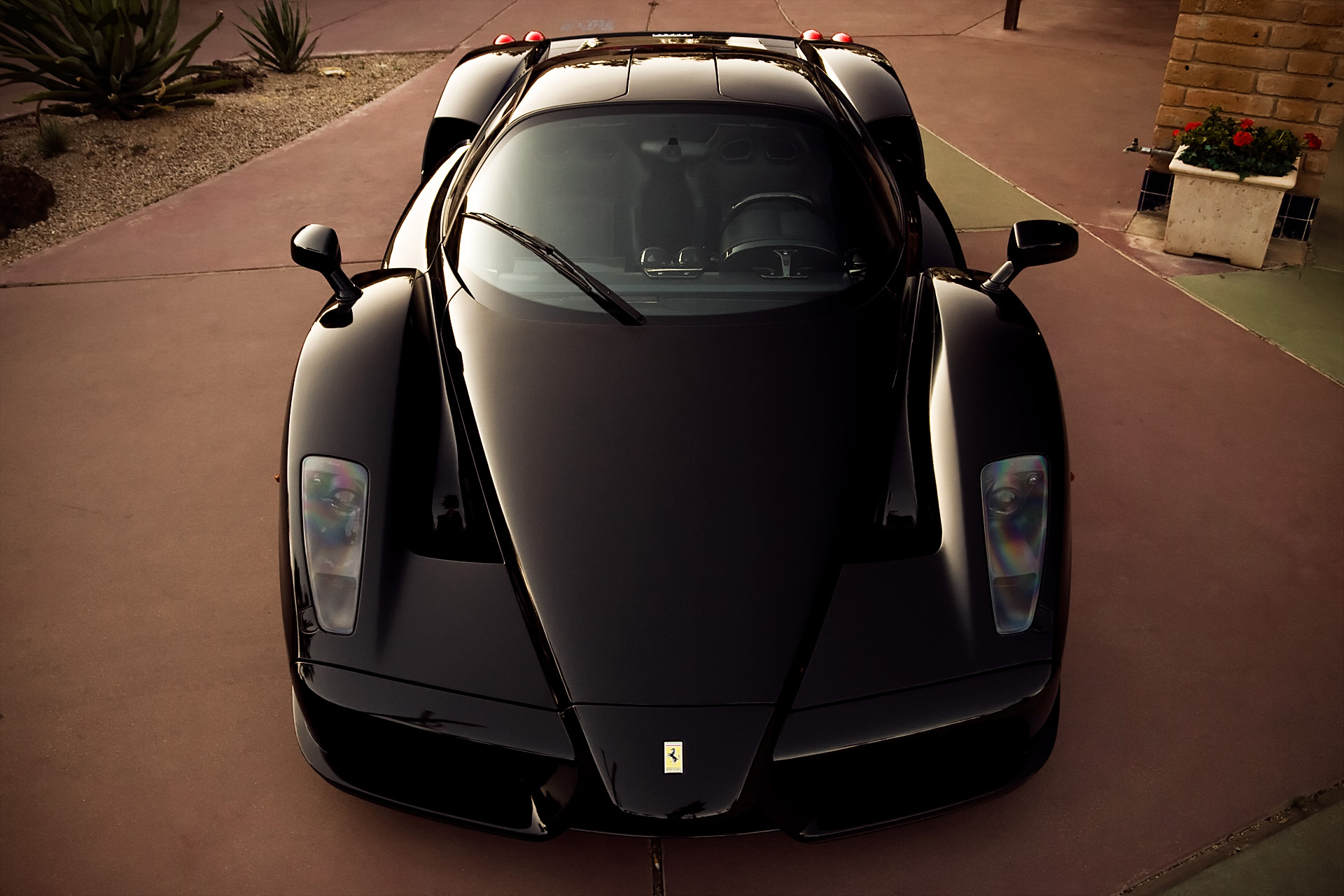 111072 Screensavers and Wallpapers Hood for phone. Download ferrari, cars, black, front view, hood, enzo pictures for free