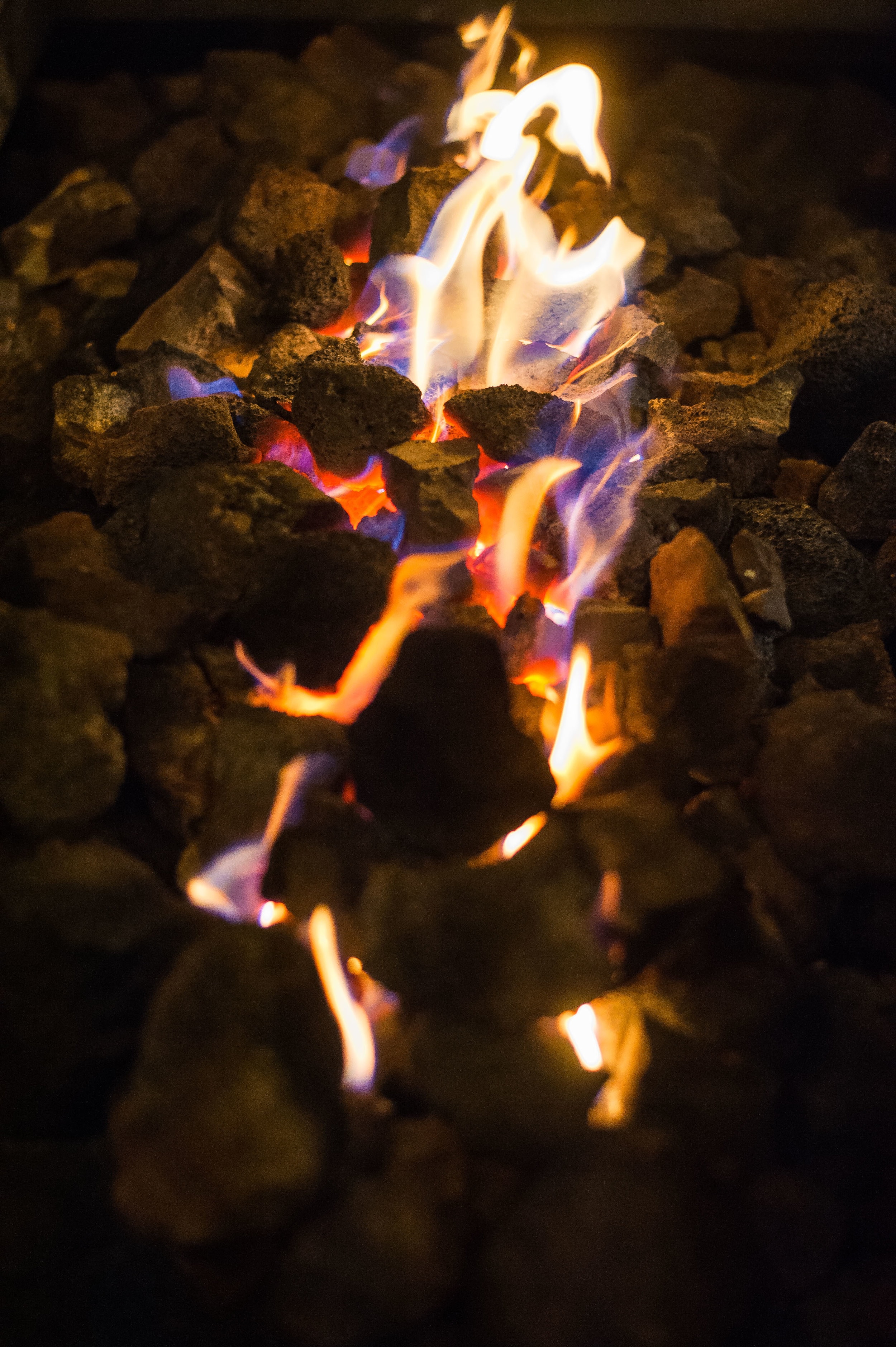 124928 download wallpaper stones, fire, dark, flame, to burn, burn screensavers and pictures for free