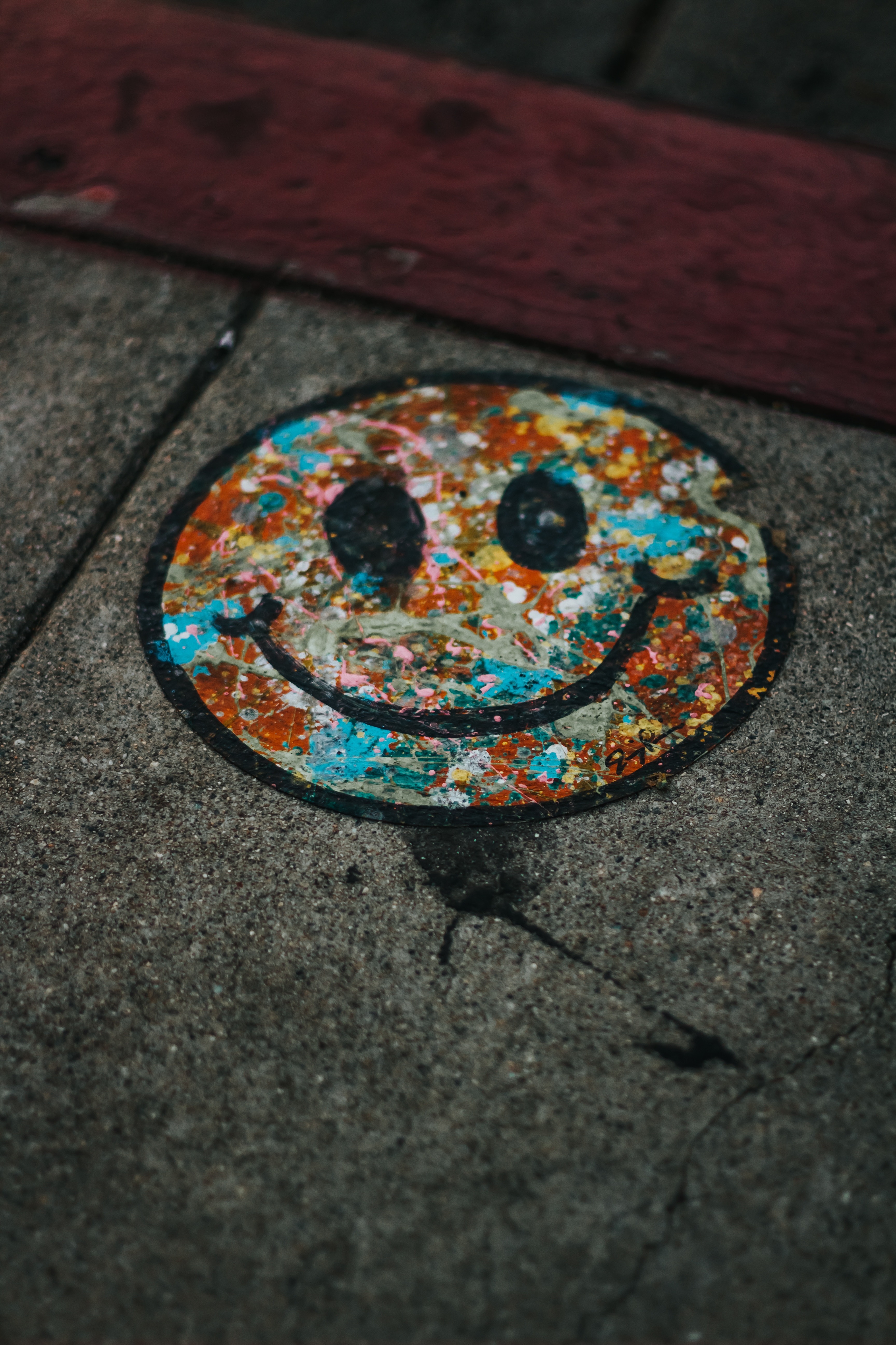 asphalt, graffiti, smile, miscellanea, miscellaneous, multicolored, motley, paint Smartphone Background
