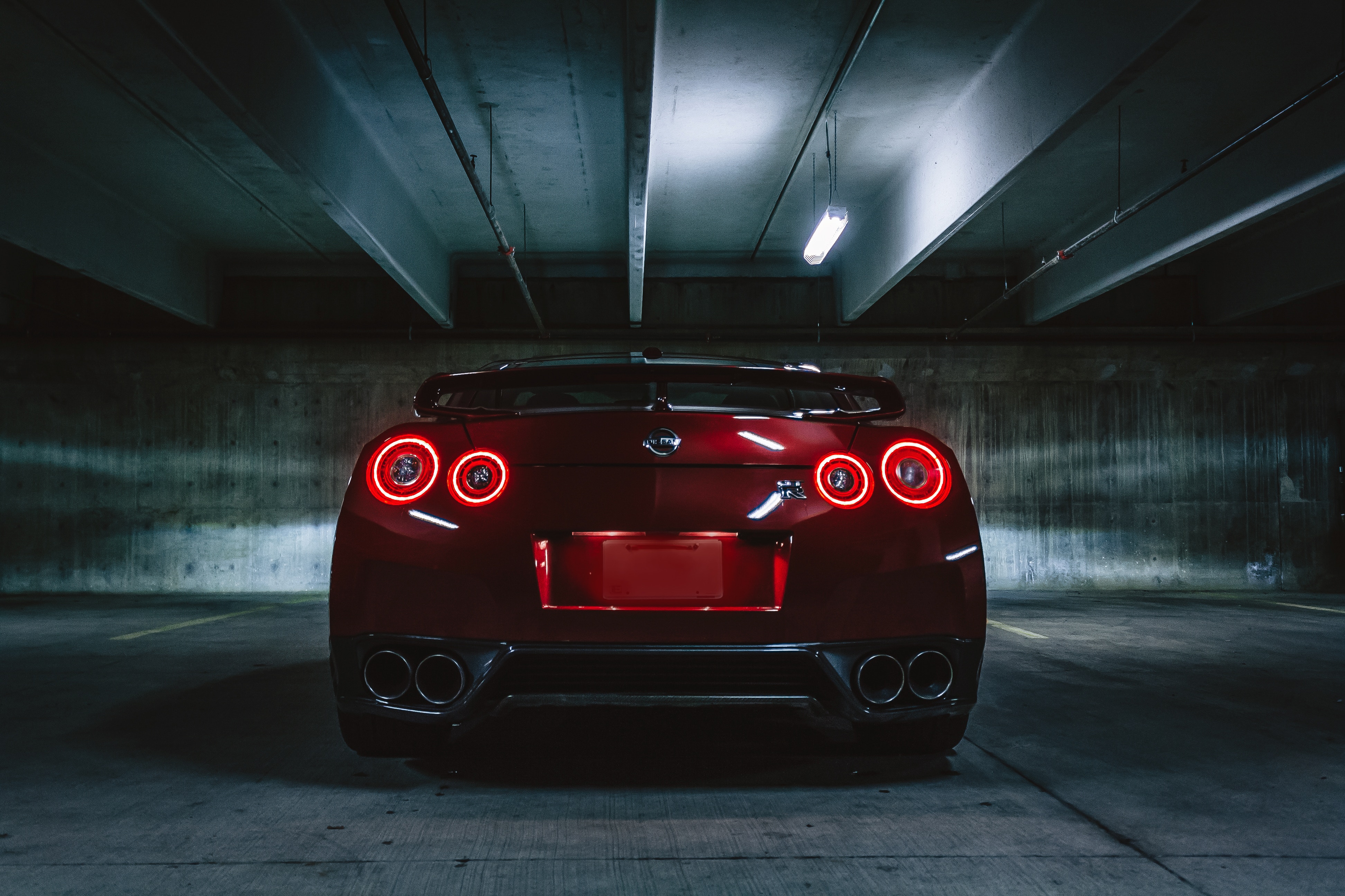 64371 download wallpaper nissan gtr, nissan, cars, lights, dark, back view, rear view, headlights screensavers and pictures for free
