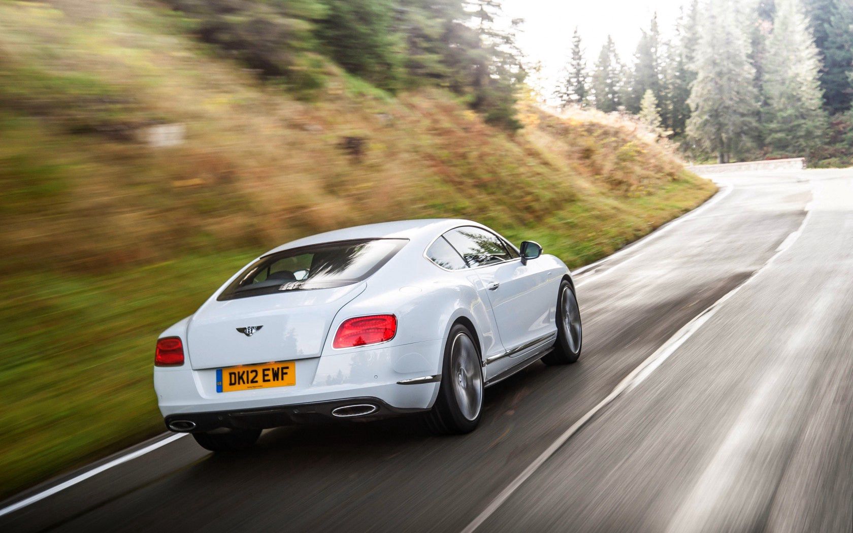 54914 Screensavers and Wallpapers Bentley for phone. Download auto, bentley, cars, white, traffic, movement, back view, rear view, gt, continental pictures for free