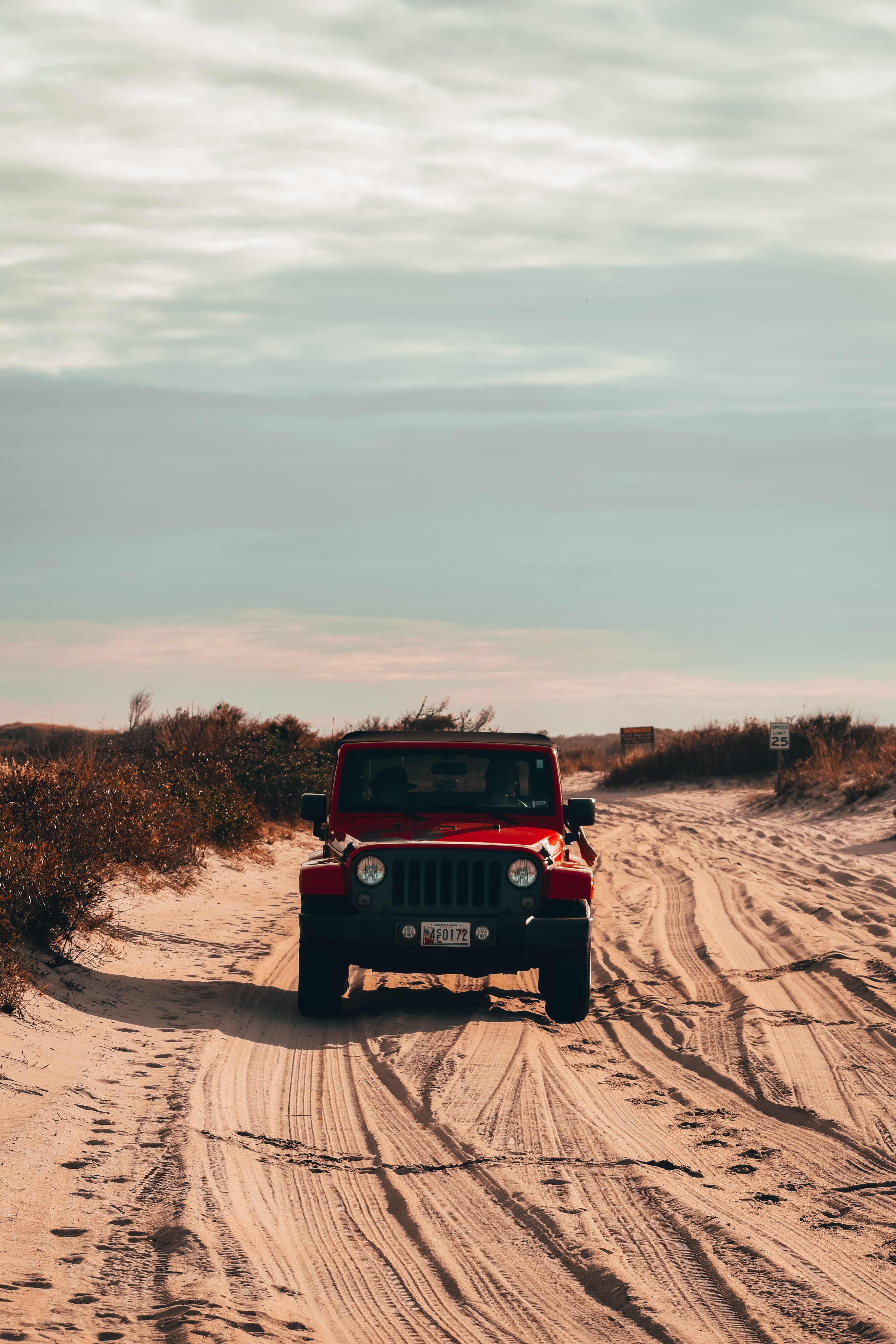 Mobile wallpaper jeep wrangler, jeep, sand, cars, red, car, suv