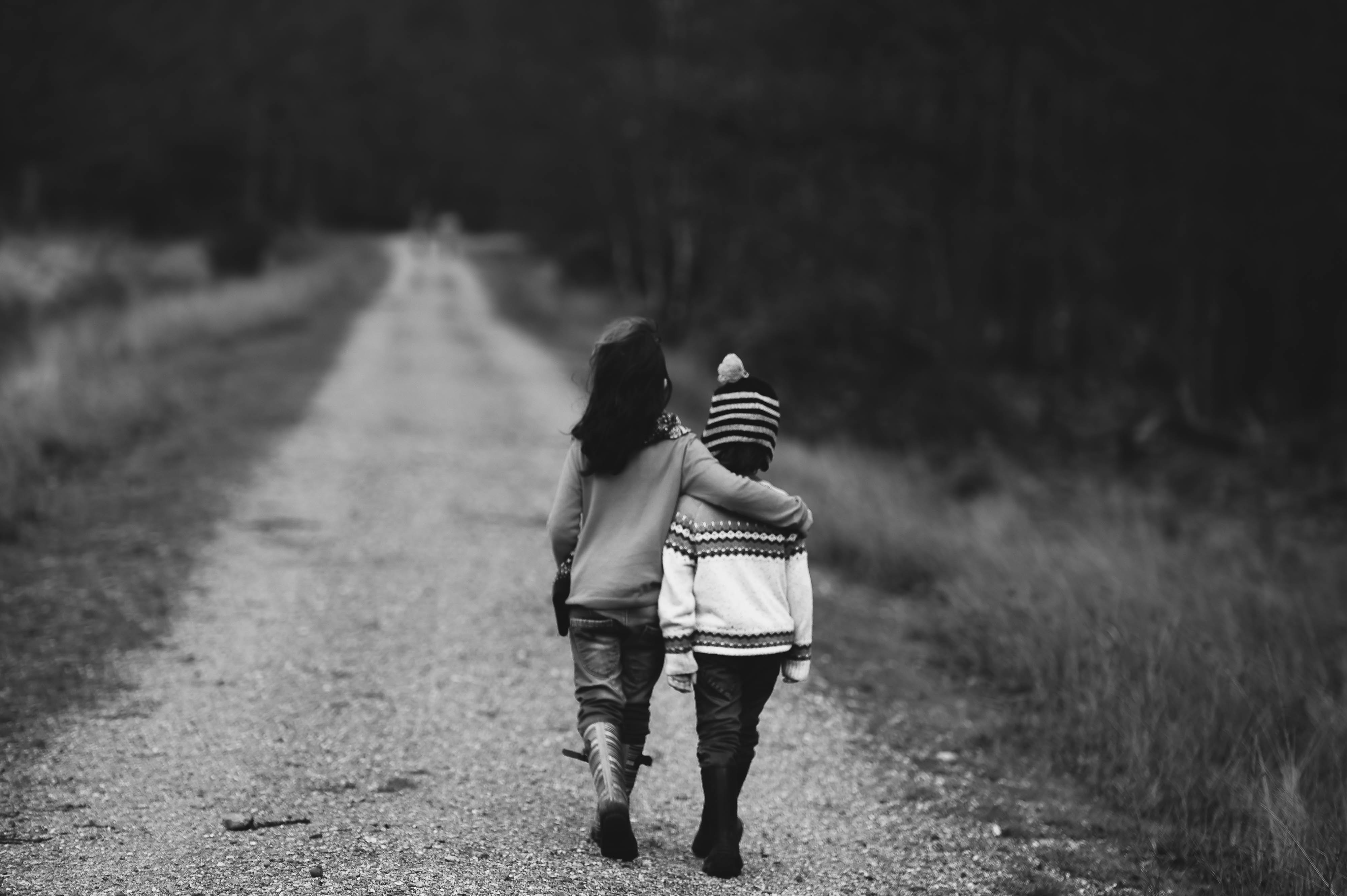 131854 download wallpaper stroll, children, miscellanea, miscellaneous, road, bw, chb, friends screensavers and pictures for free