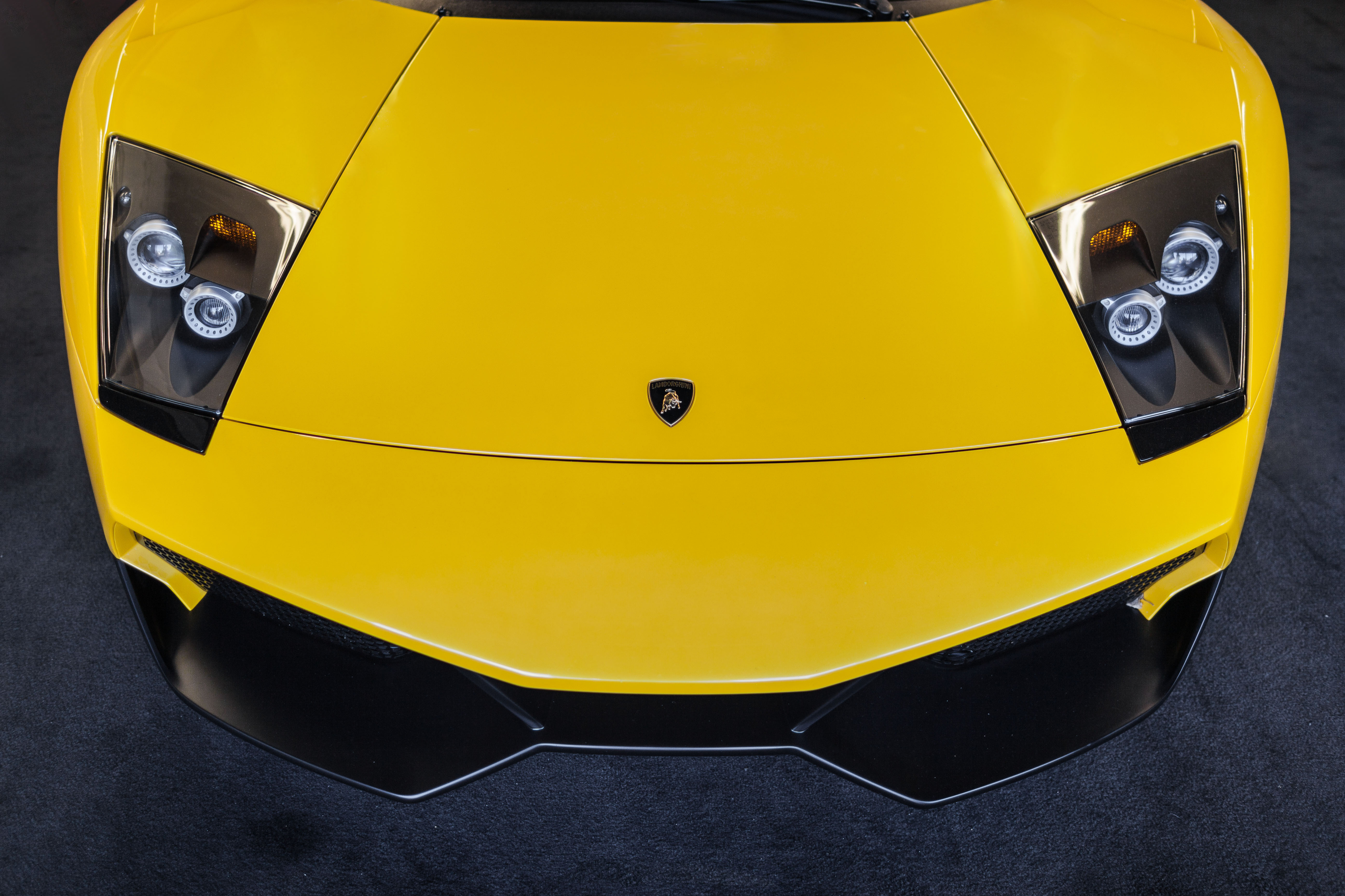117188 Screensavers and Wallpapers Hood for phone. Download lamborghini, cars, yellow, hood, murcielago pictures for free