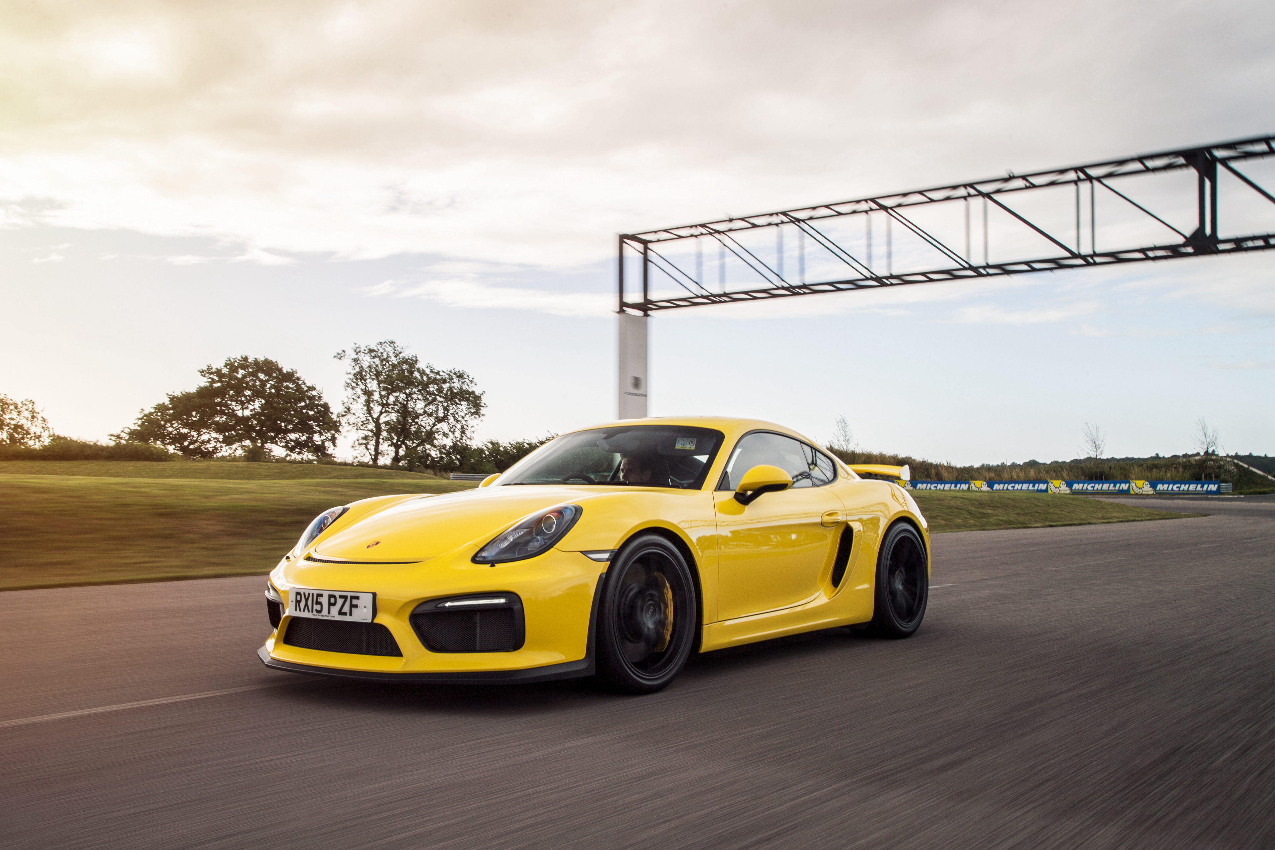 52514 download wallpaper porsche, cars, yellow, side view, cayman, gt4 screensavers and pictures for free
