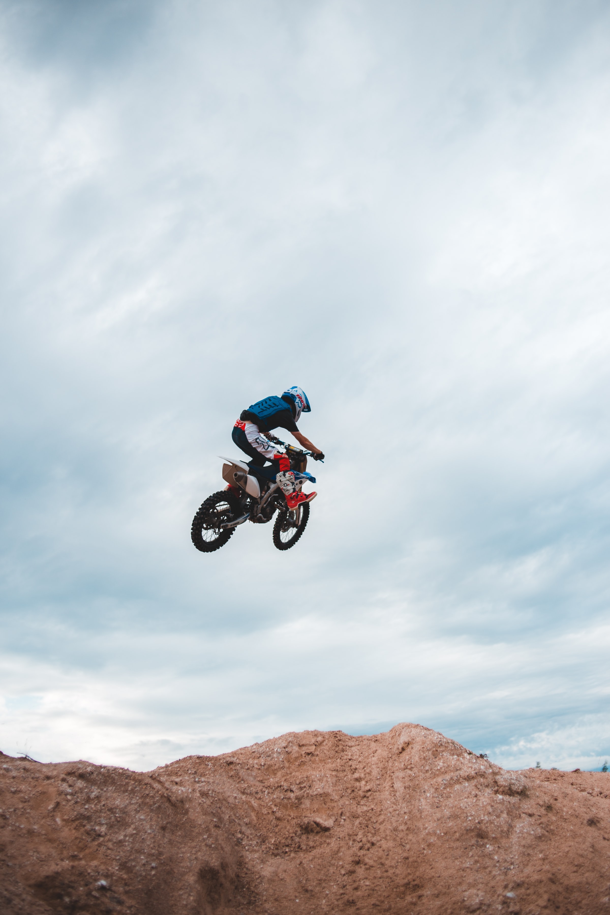 156172 Screensavers and Wallpapers Motorcyclist for phone. Download sand, motorcycles, motorcyclist, motorcycle, bike, bounce, jump, trick pictures for free