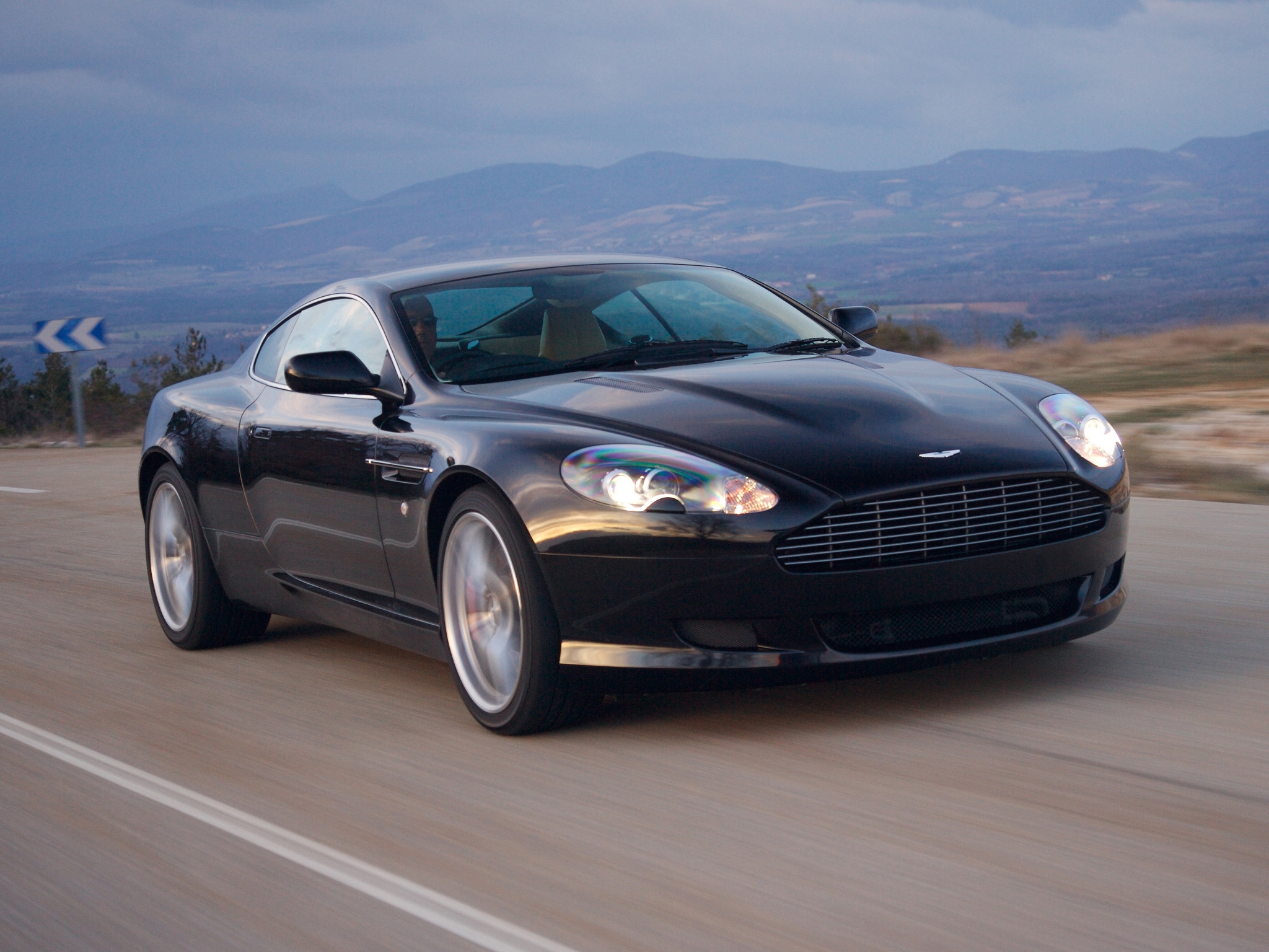 58980 download wallpaper sports, auto, nature, mountains, aston martin, cars, blue, asphalt, front view, speed, style, db9, 2006 screensavers and pictures for free