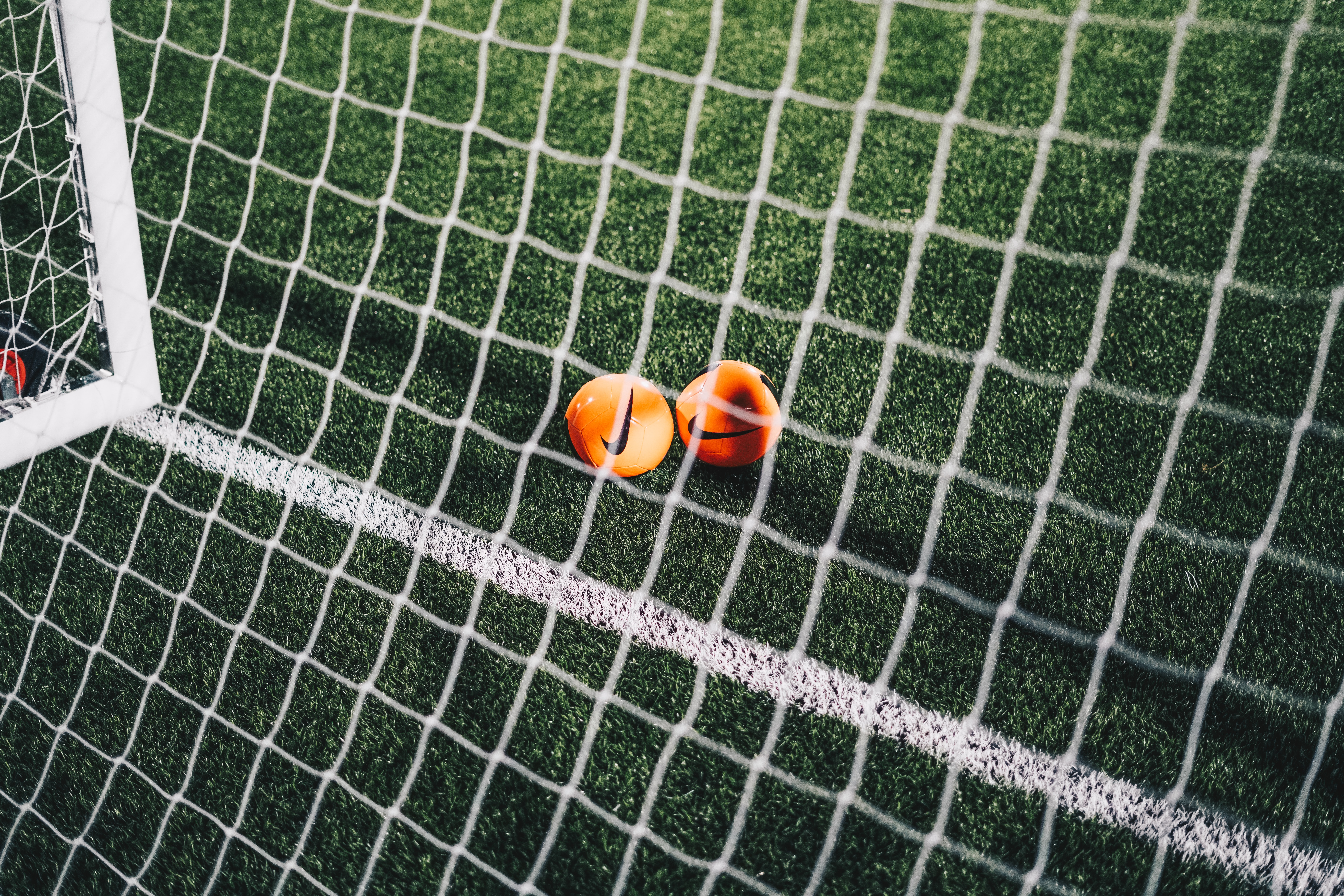 123198 download wallpaper football, sports, grid, balls, football field, gate, goal screensavers and pictures for free