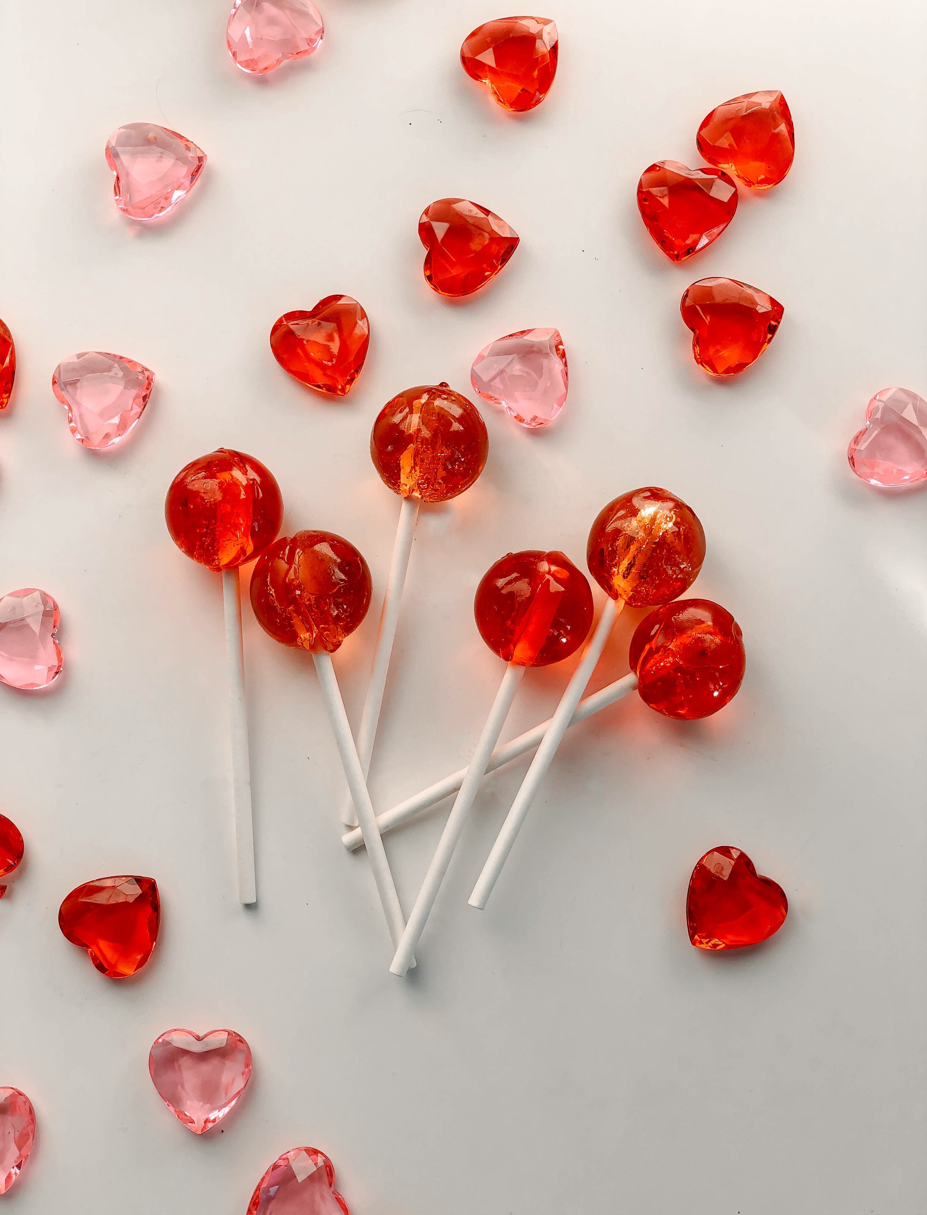 92285 download wallpaper food, hearts, pink, candies, red, lollipops screensavers and pictures for free