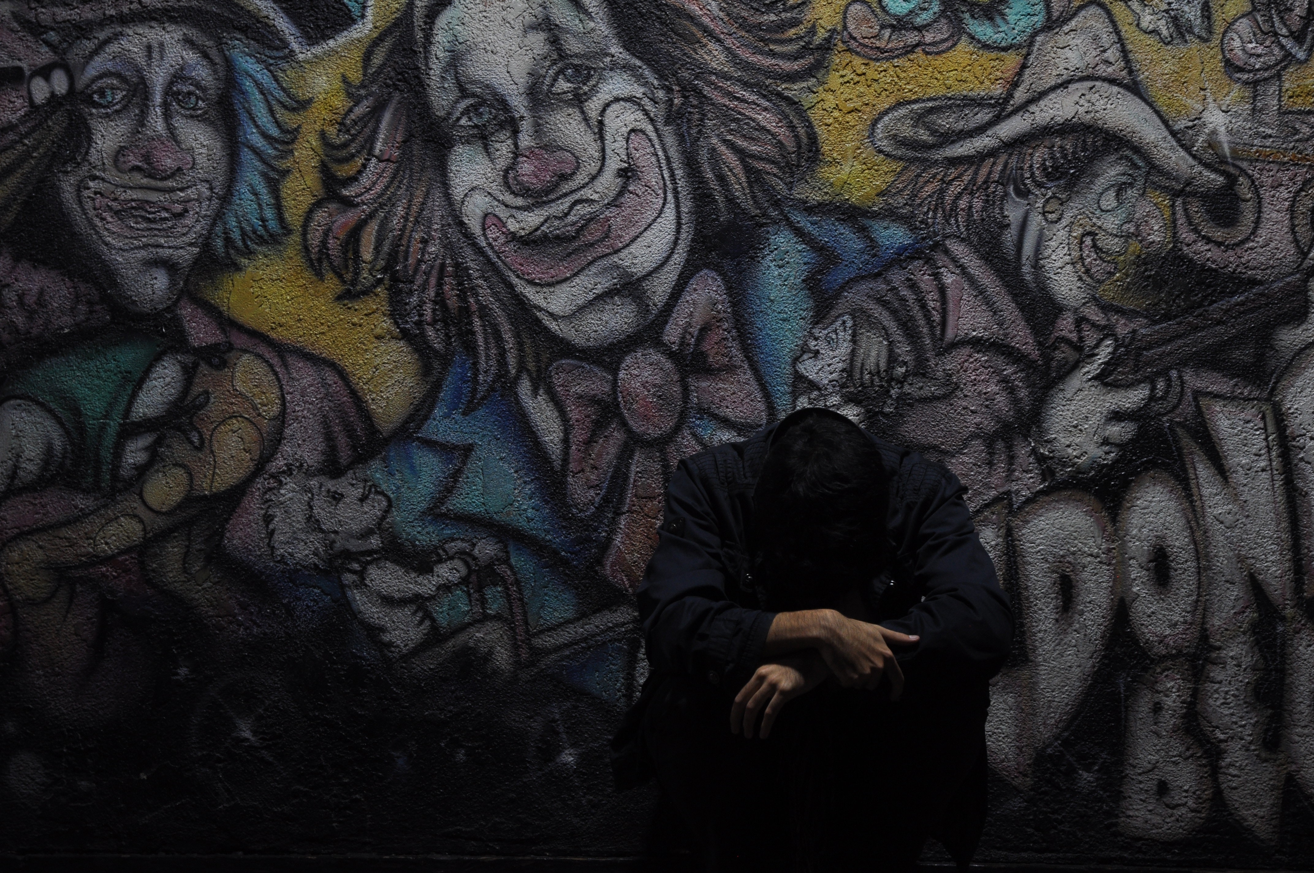 wall, graffiti, miscellanea, miscellaneous, sadness, human, person, loneliness, sorrow phone background