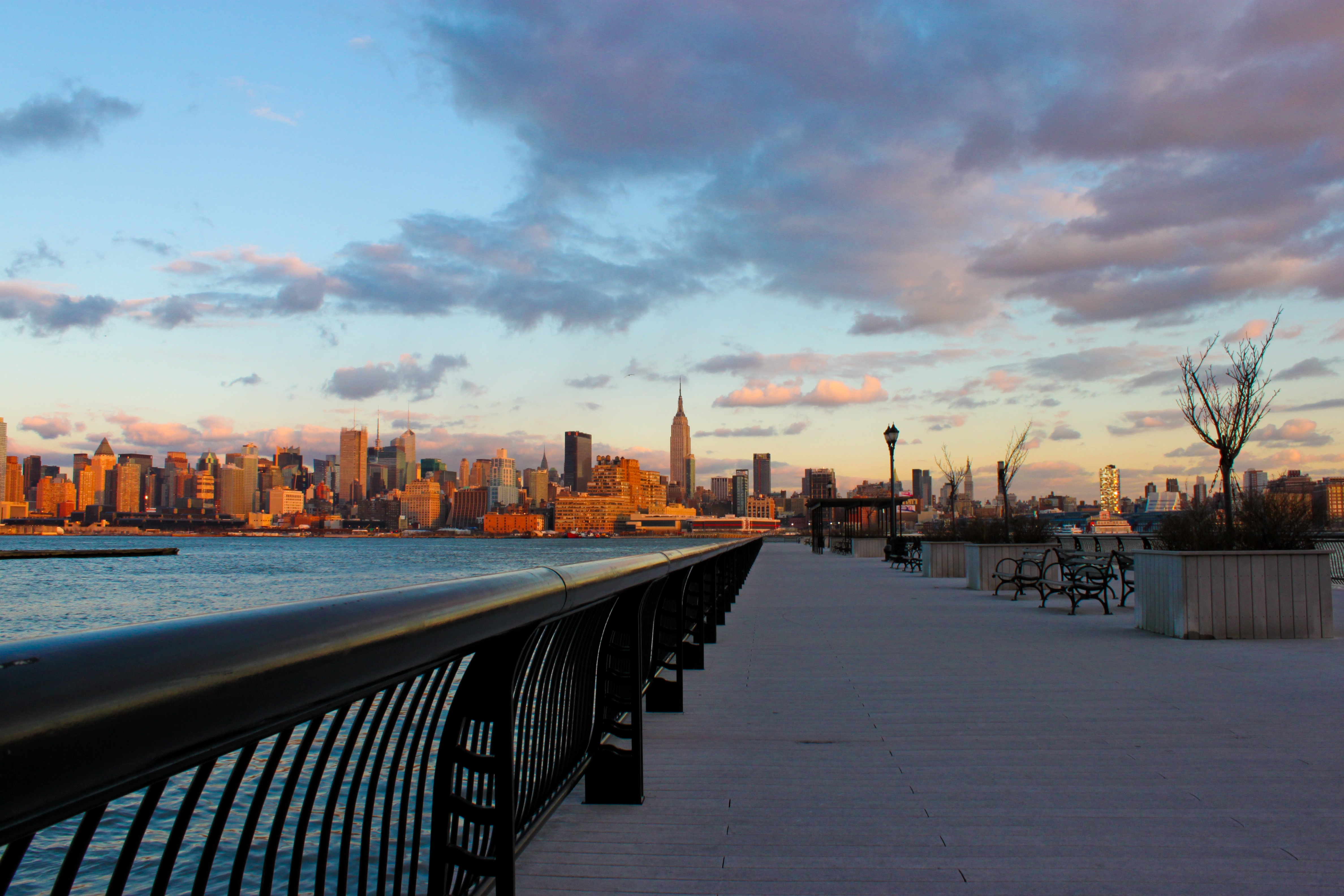 vertical wallpaper sunset, embankment, quay, water, city, cities, skyscrapers, ny, evening, new york