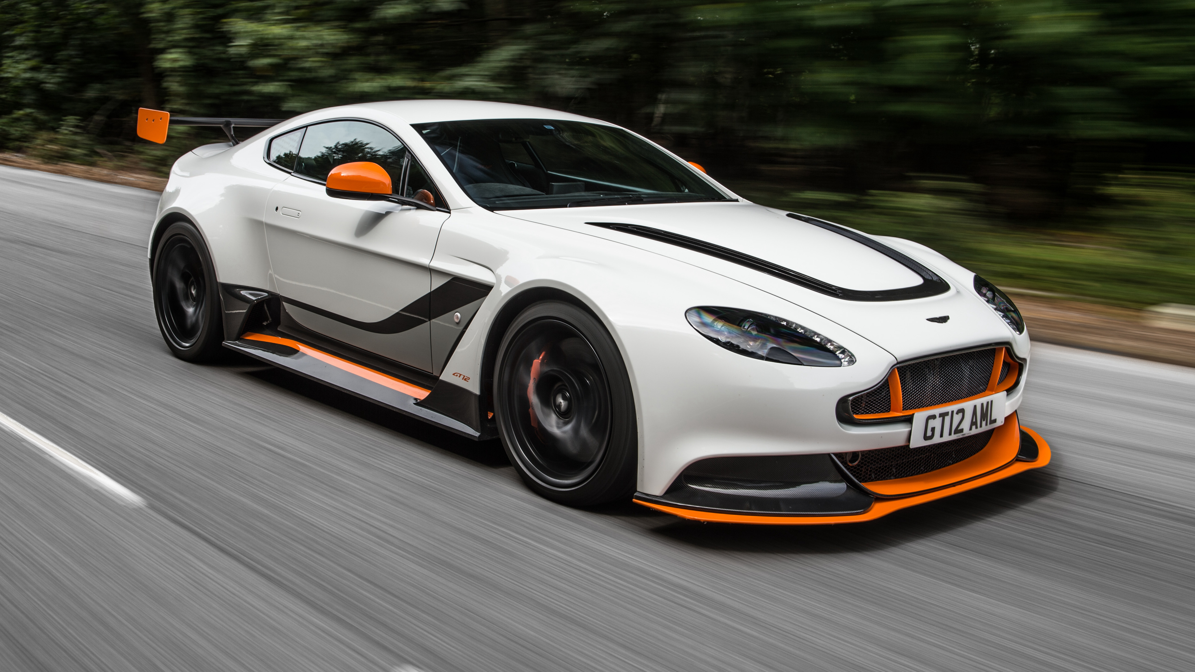 136205 Screensavers and Wallpapers Movement for phone. Download aston martin, cars, traffic, movement, side view, vantage pictures for free