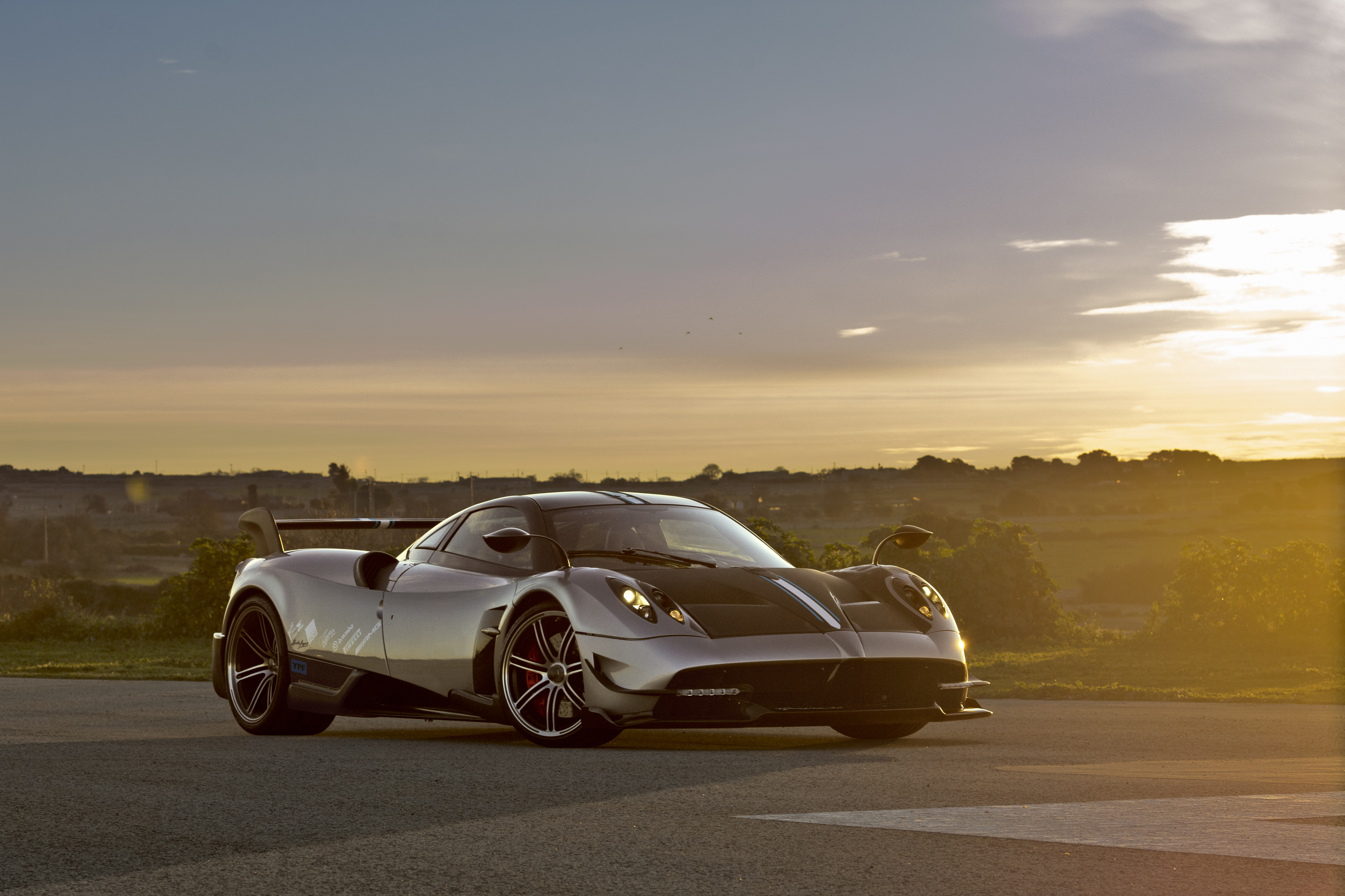 127276 download wallpaper pagani, cars, road, side view, huayra screensavers and pictures for free