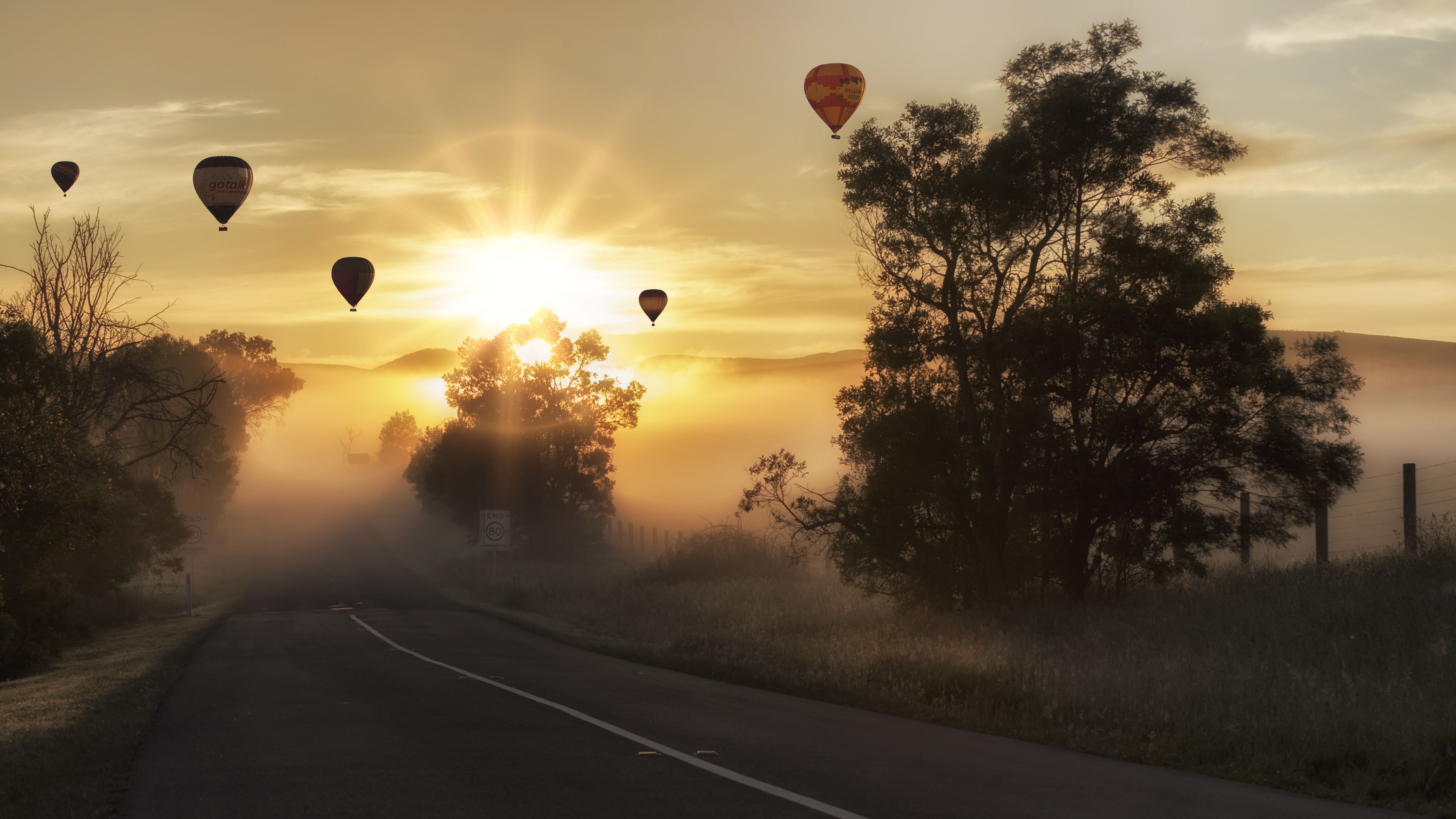 nature, sunset, balloons, road, fog, sunlight Smartphone Background